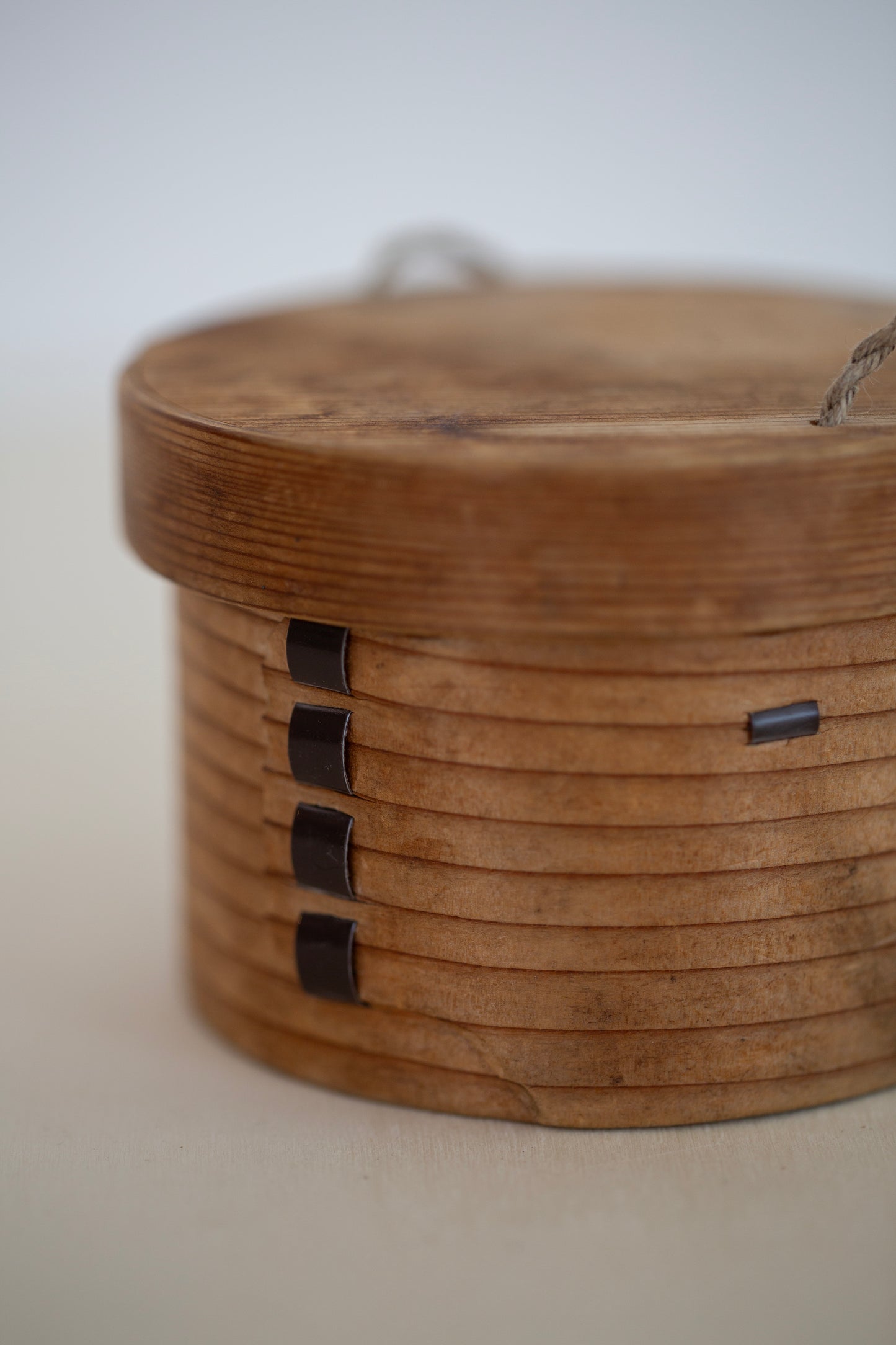Little bent wood container with string