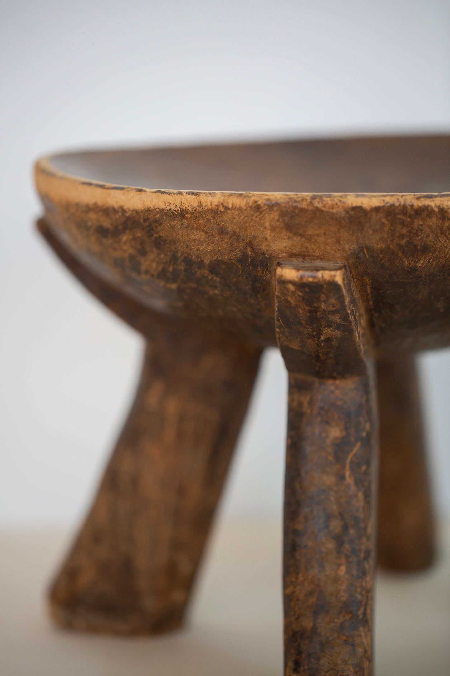 handcarved wooden stool