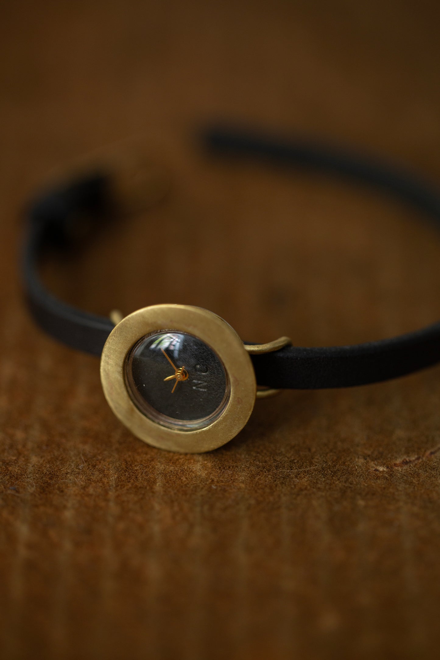 Black/brass 'PETAL' watch
