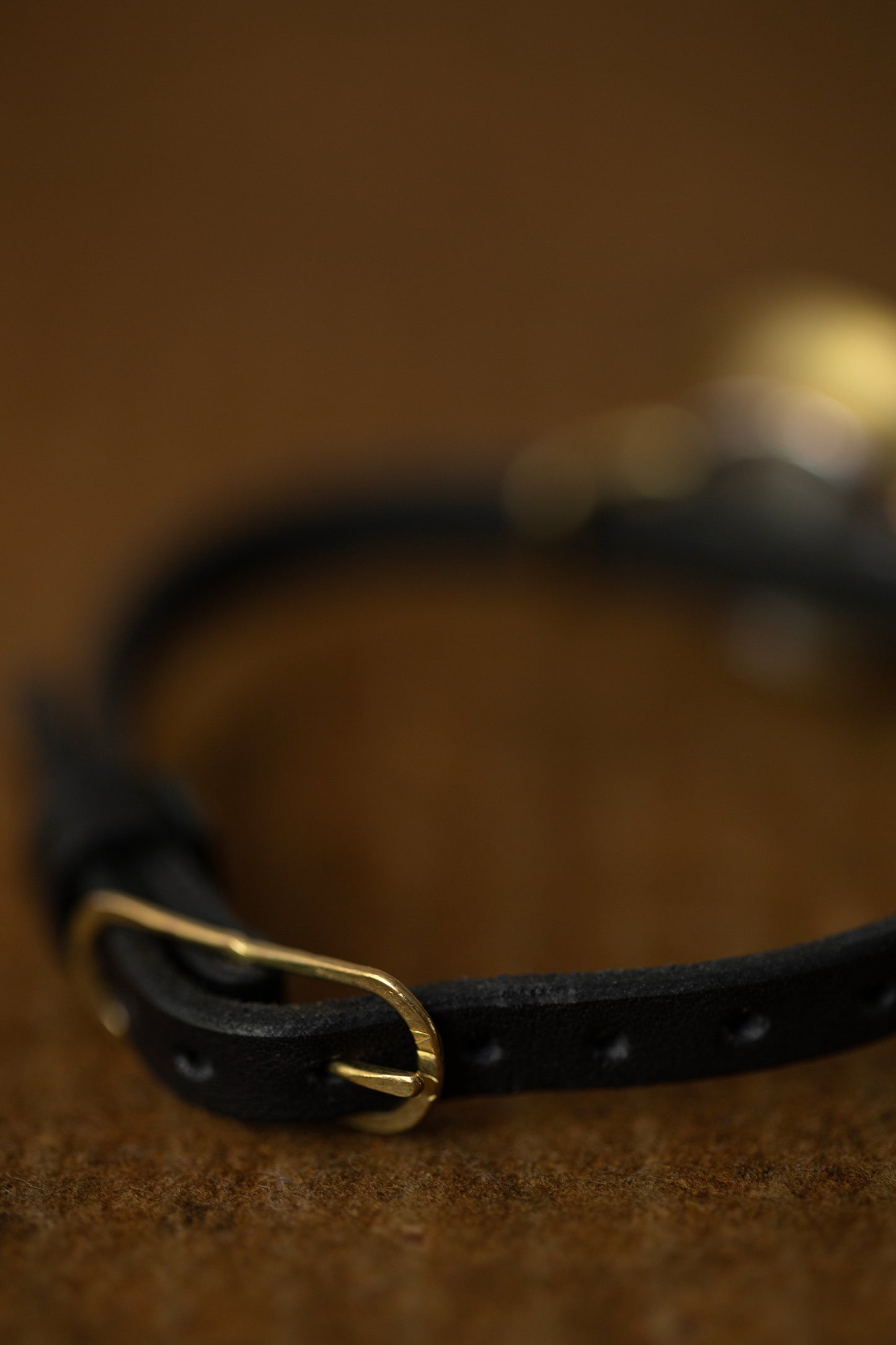Black/brass 'PETAL' watch
