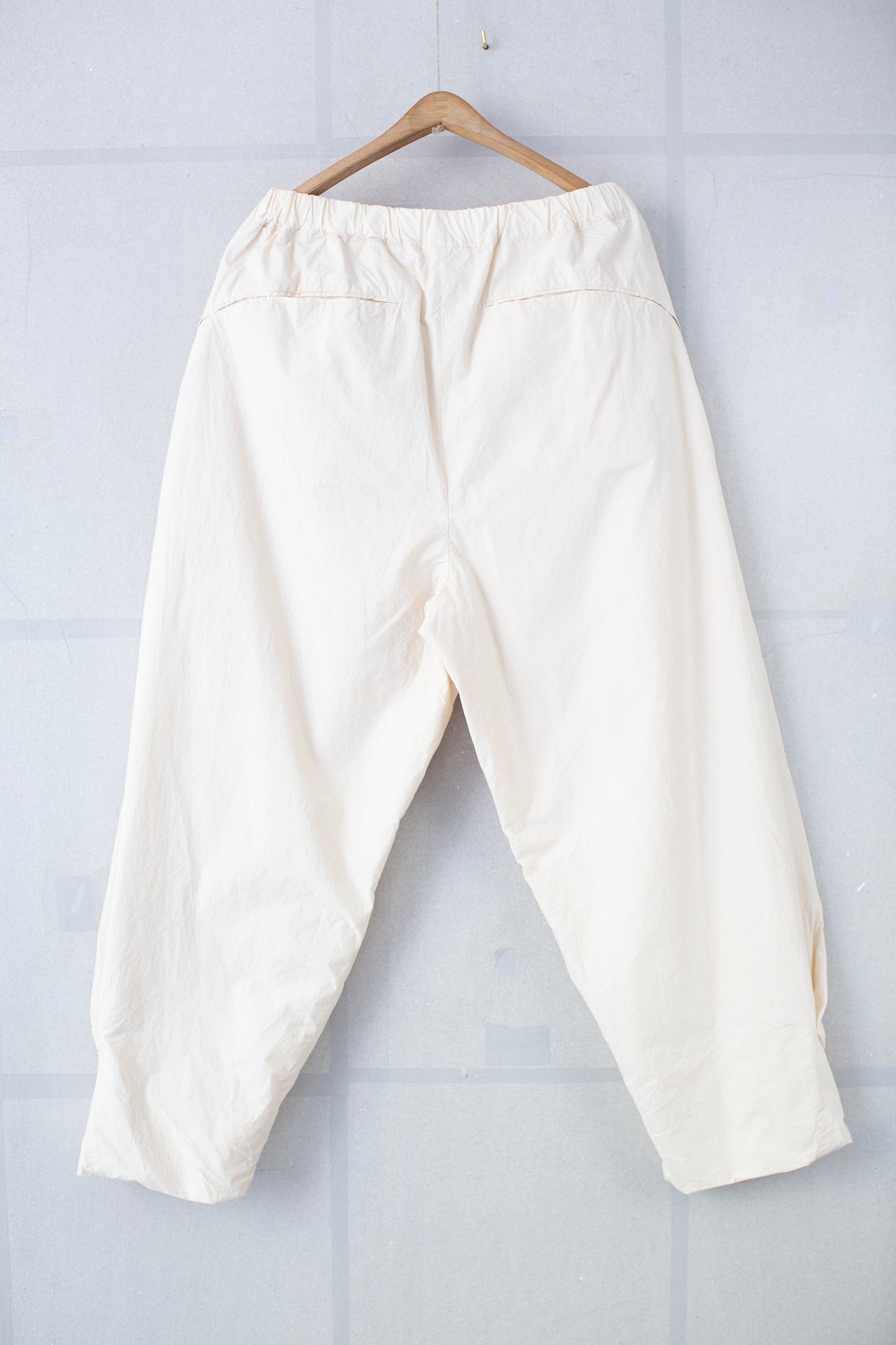 Fabric Forming Twist Pants in Off White