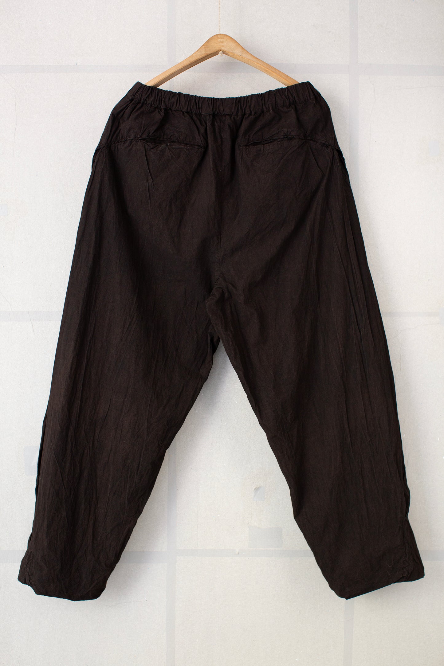 Fabric Forming Twist Pants in Natural Dye Dark Mud Brown
