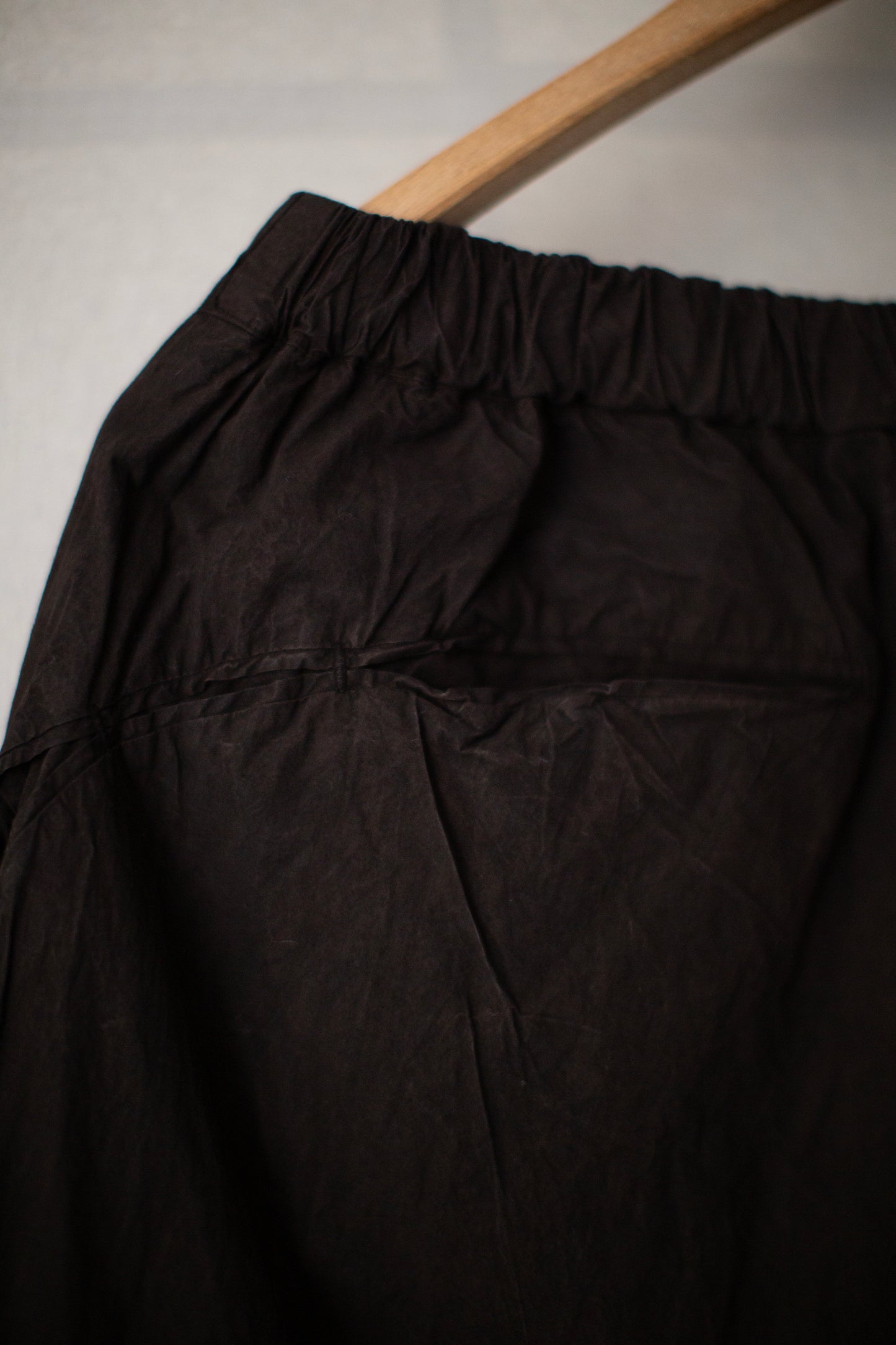 Fabric Forming Twist Pants in Natural Dye Dark Mud Brown
