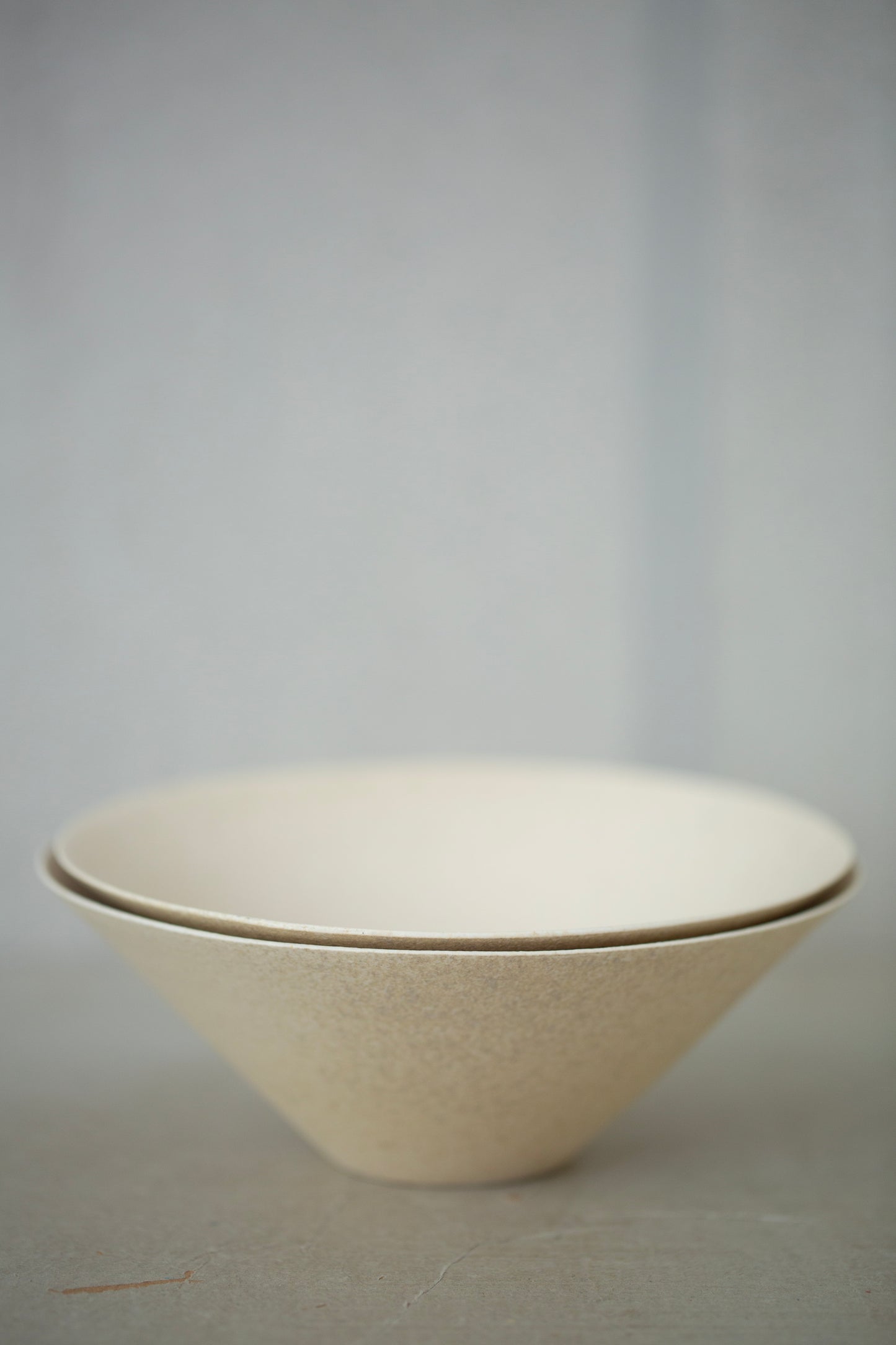 White ceramic bowls by Ciprian Tocu