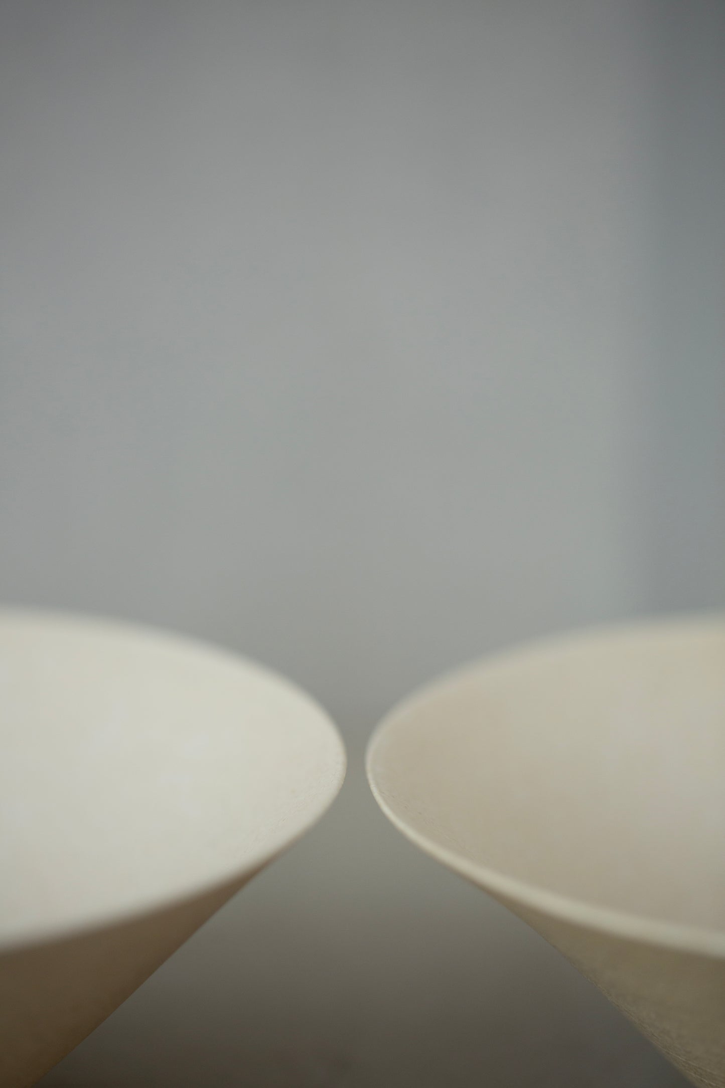 White ceramic bowls by Ciprian Tocu