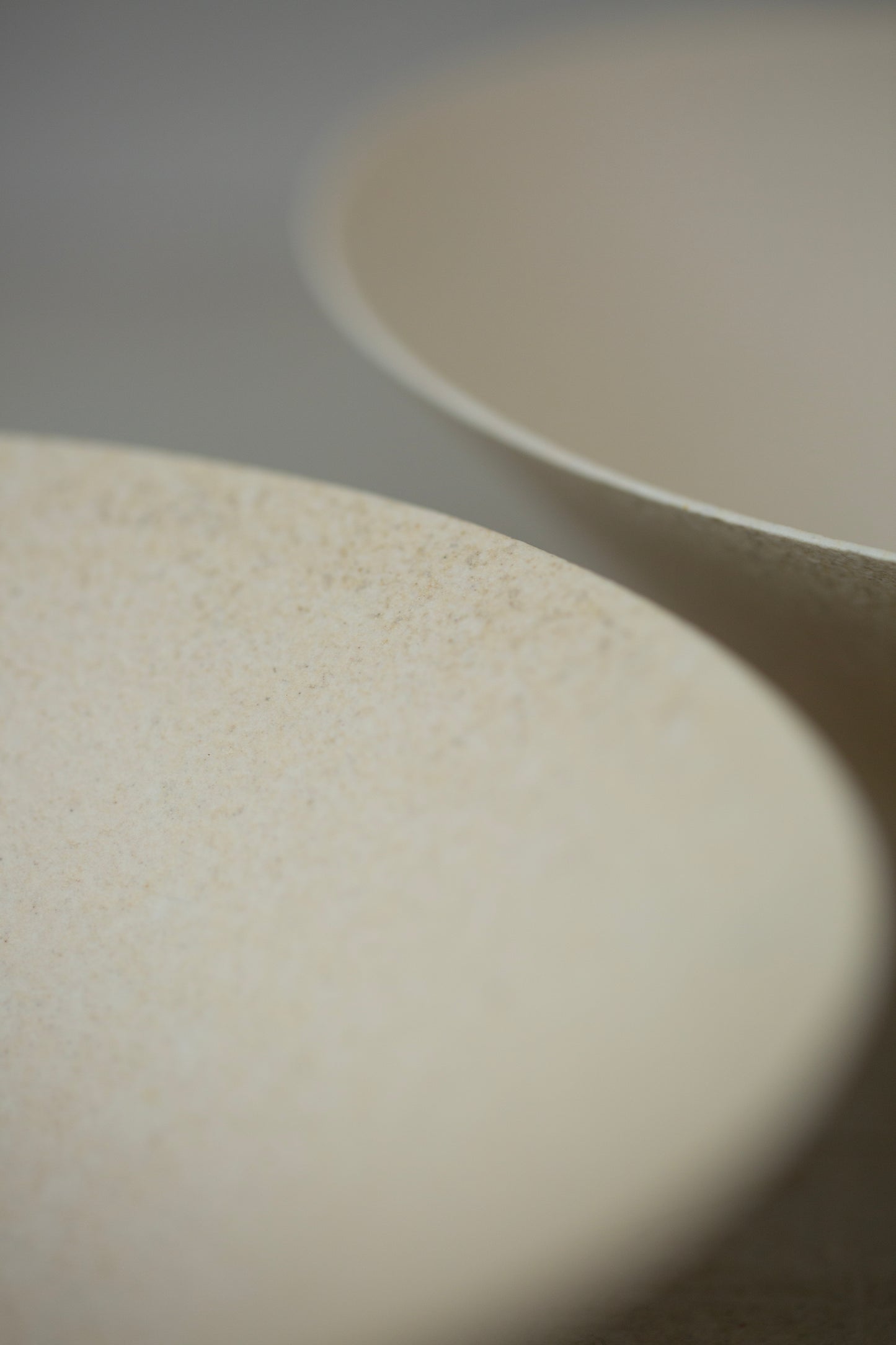 White ceramic bowls by Ciprian Tocu