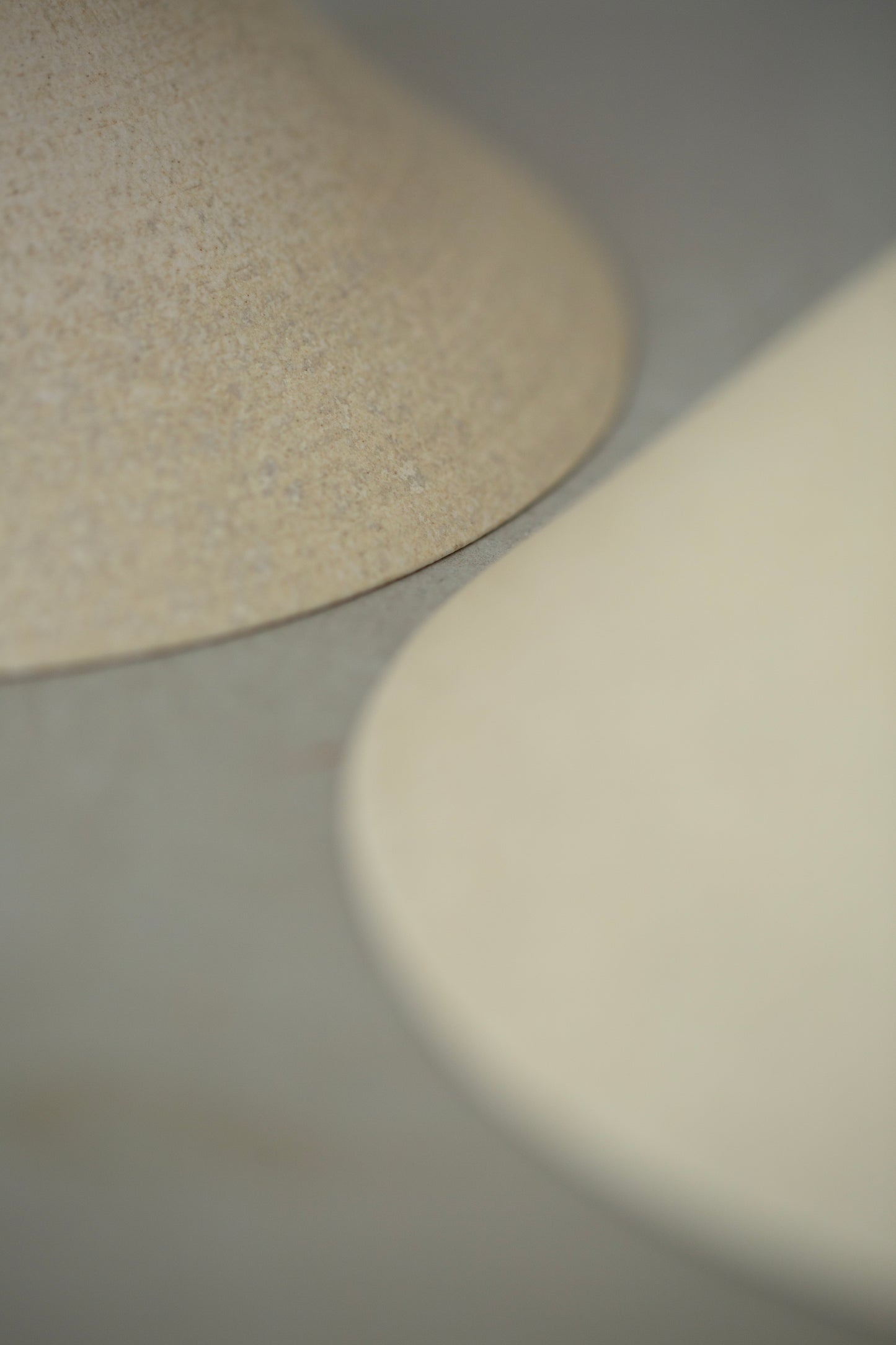 White ceramic bowls by Ciprian Tocu