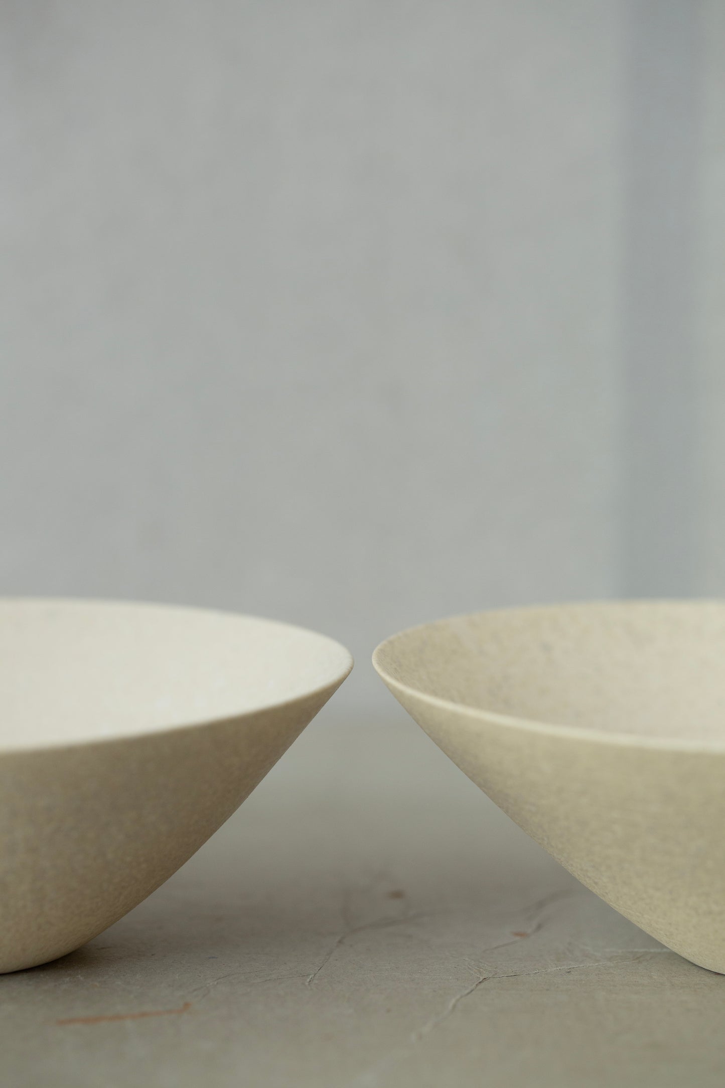 White ceramic bowls by Ciprian Tocu