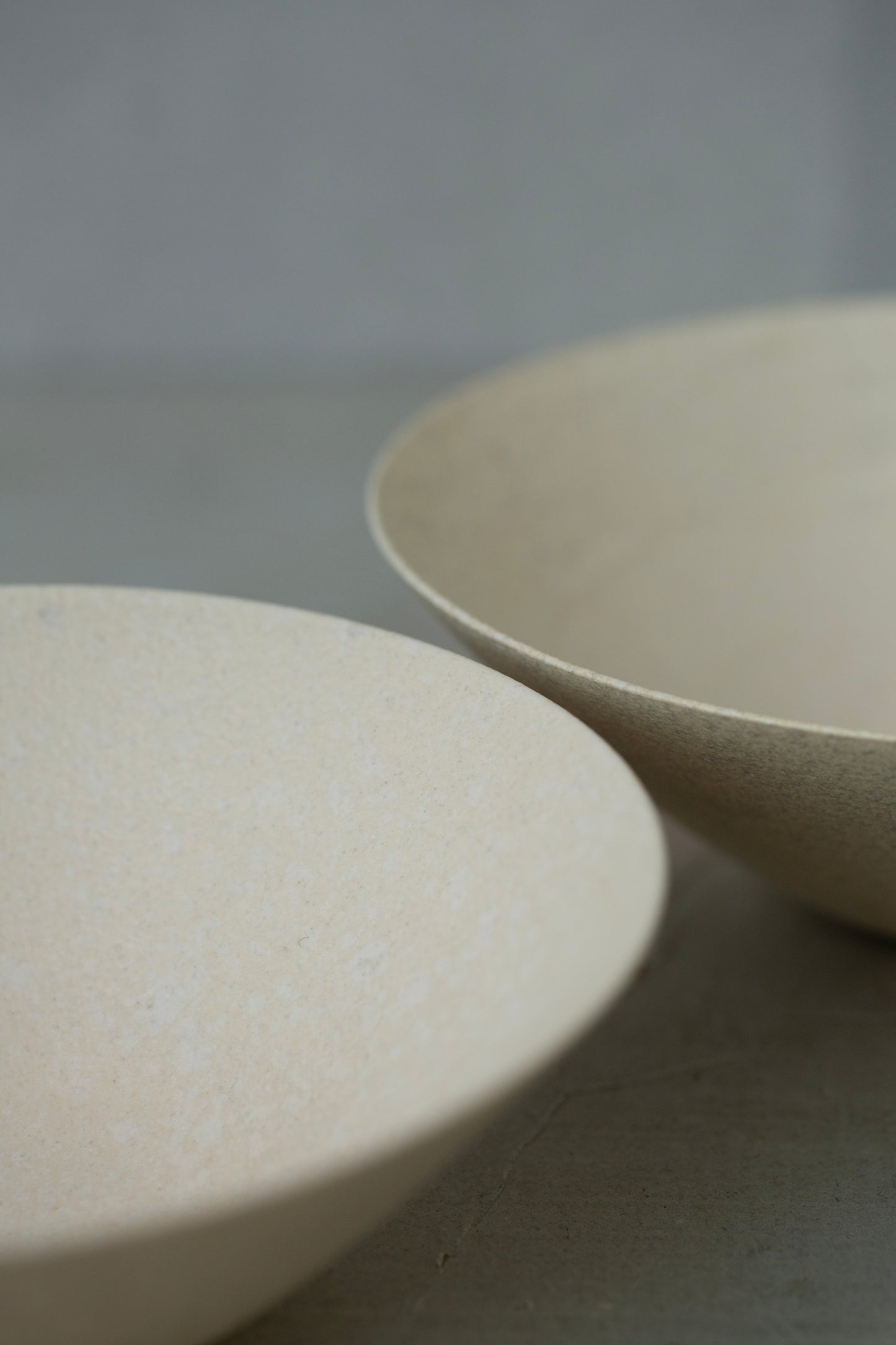 White ceramic bowls by Ciprian Tocu