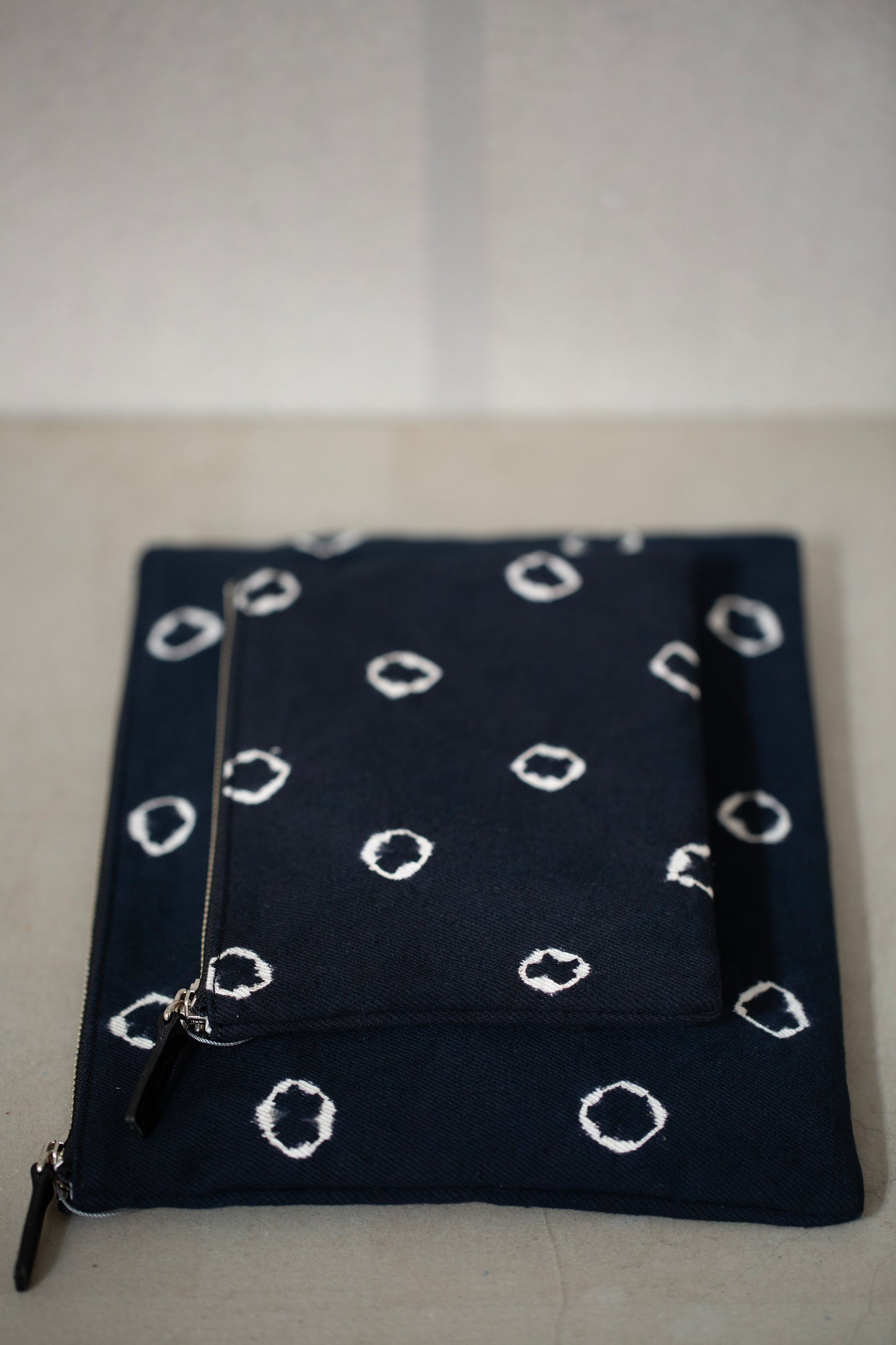 black / ivory organic cotton pouch S with shibori dyed pattern