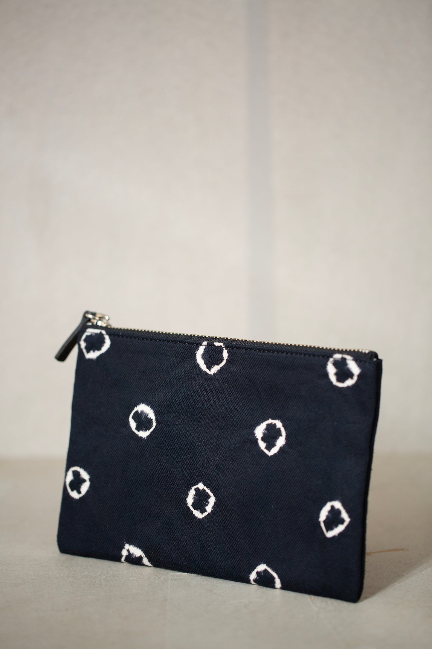 black / ivory organic cotton pouch S with shibori dyed pattern