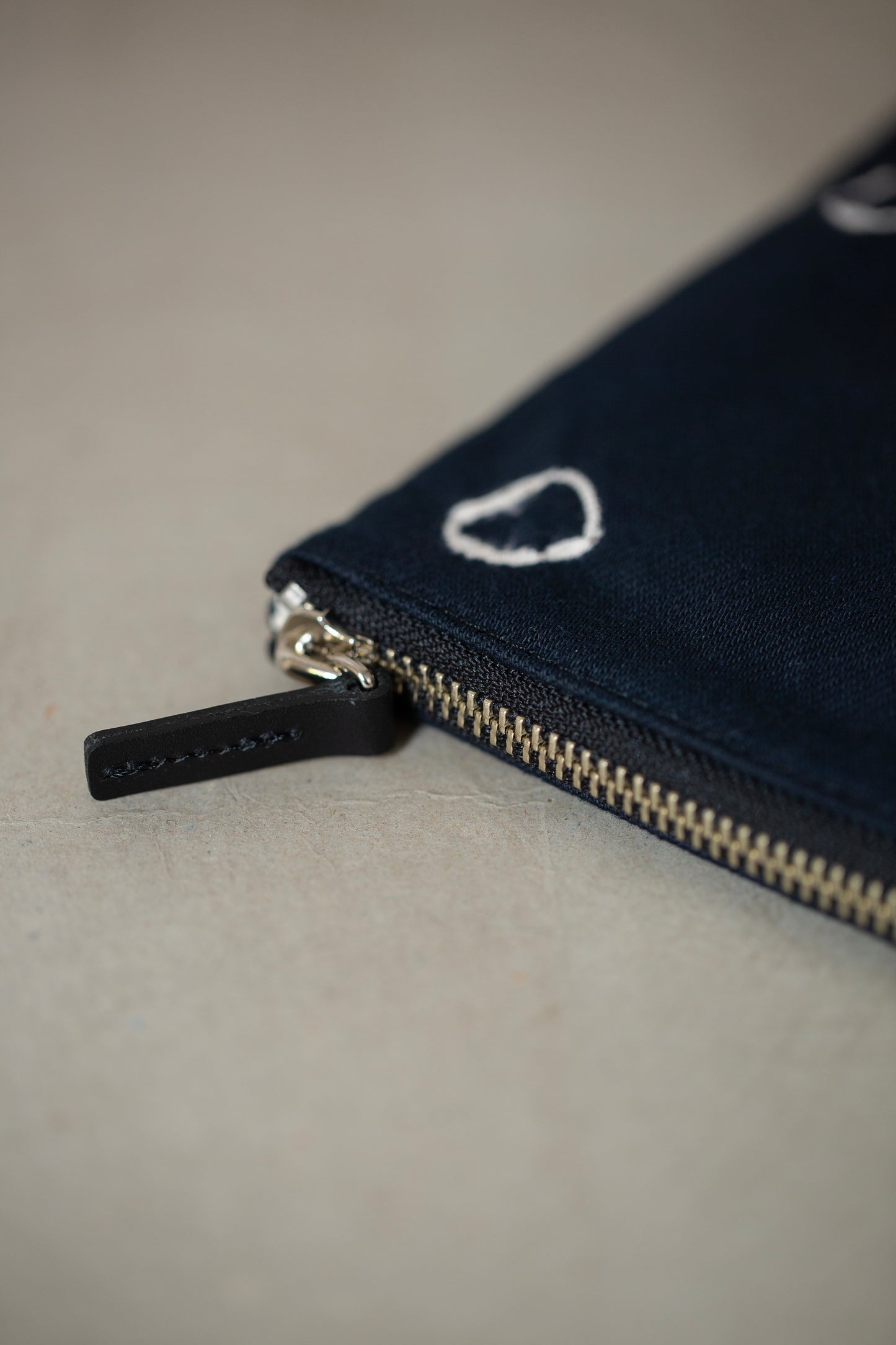 black / ivory organic cotton pouch S with shibori dyed pattern
