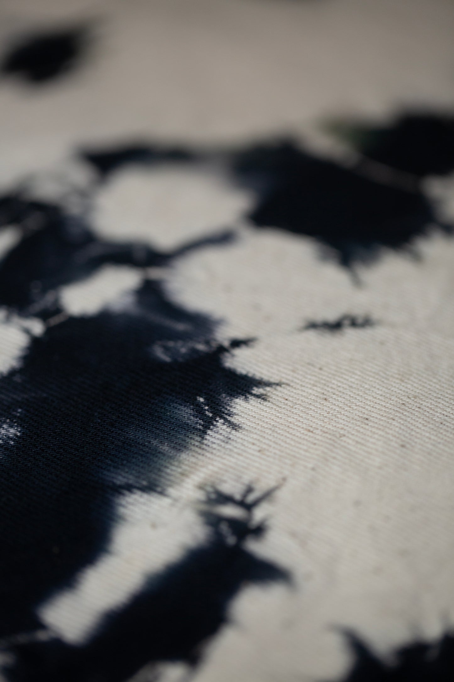 black / ivory organic cotton pouch M with shibori dyed pattern