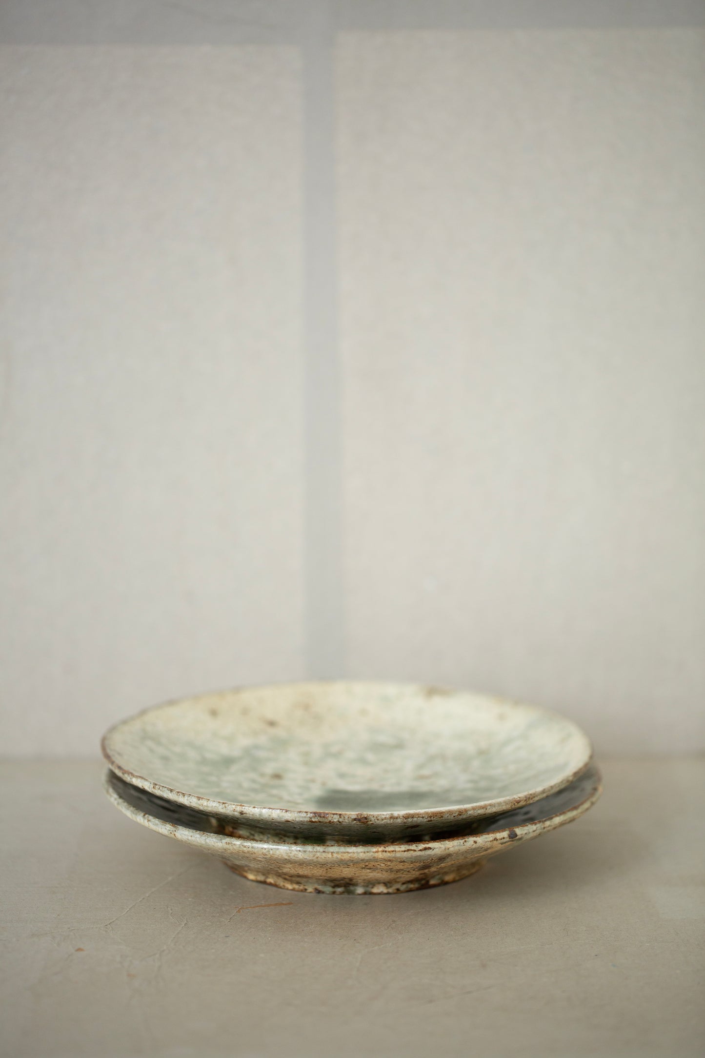 Large ceramic plates by Takayuki Ueda