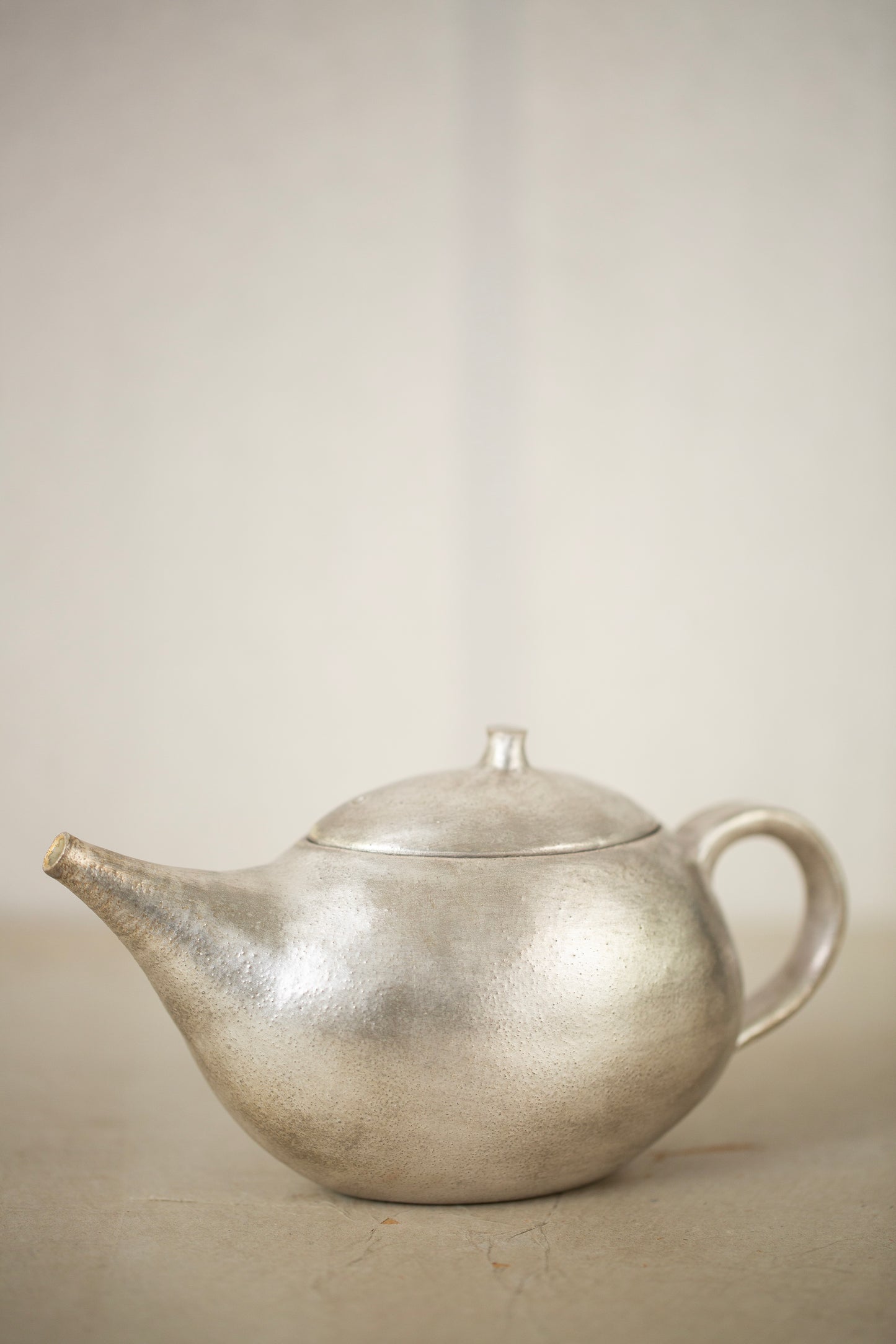 Silver glaze tea pot