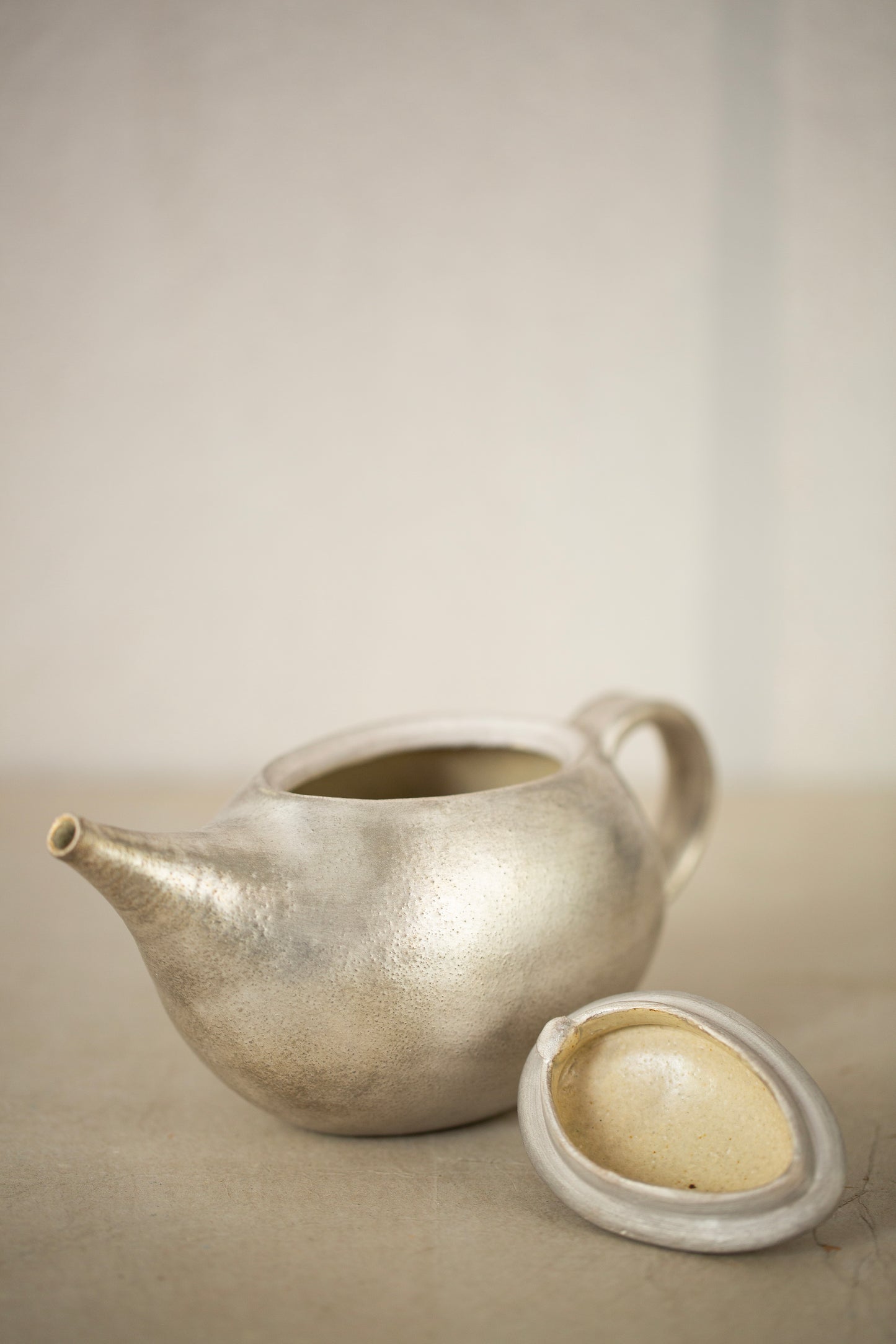 Silver glaze tea pot