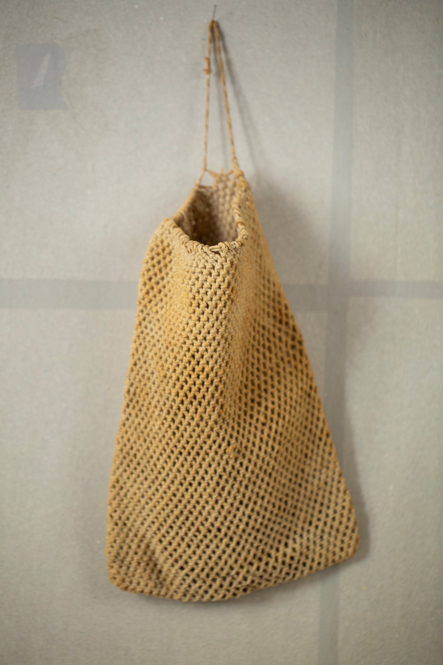 Antique hand knotted foraging pouch bag.