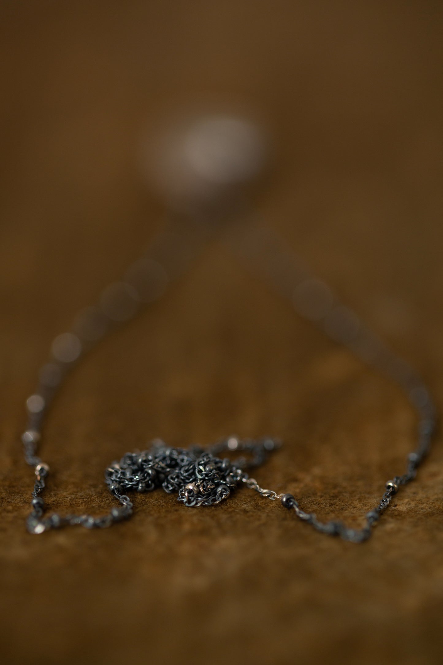 Necklace with silver framed glass