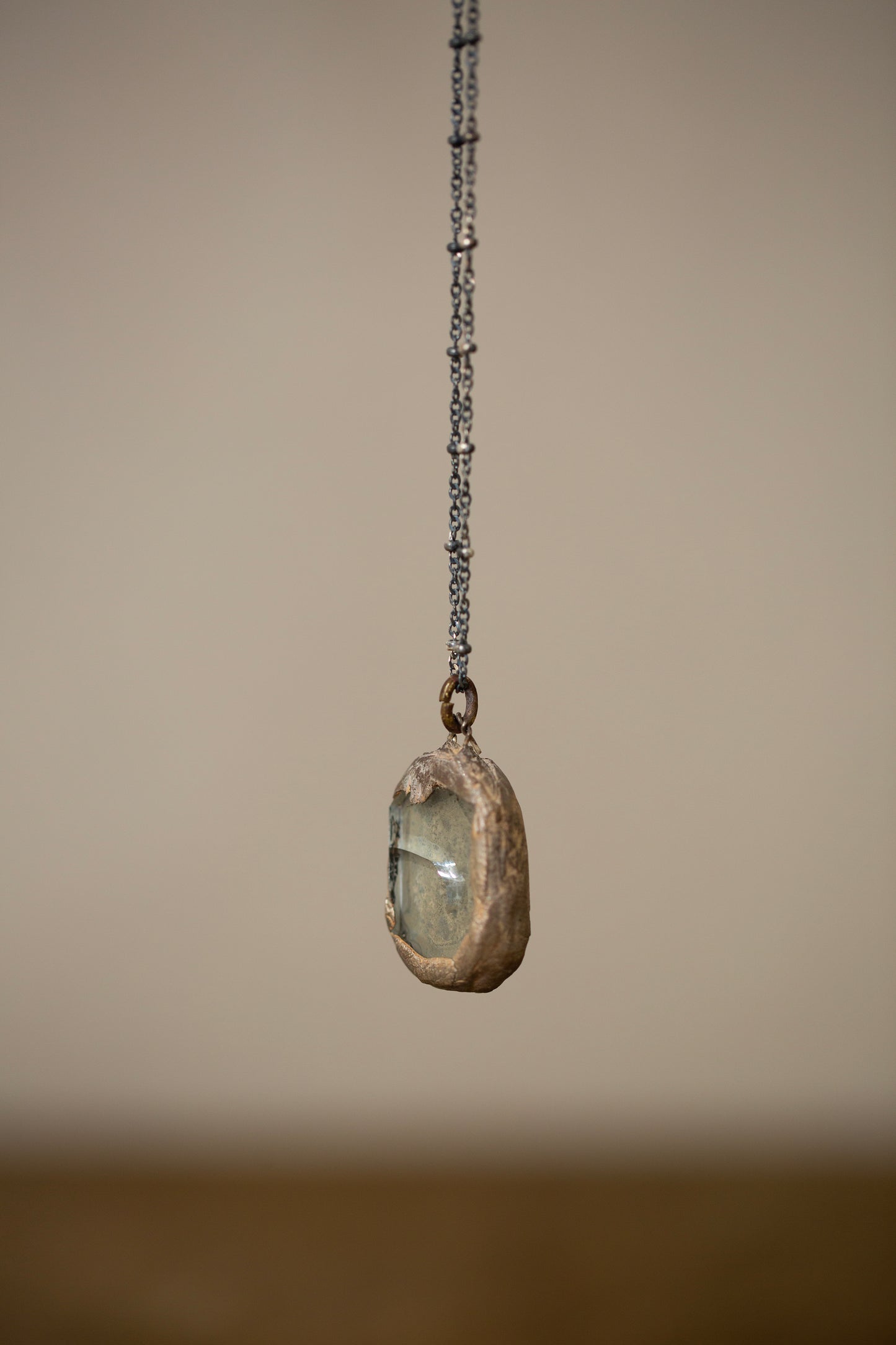 Necklace with silver framed glass