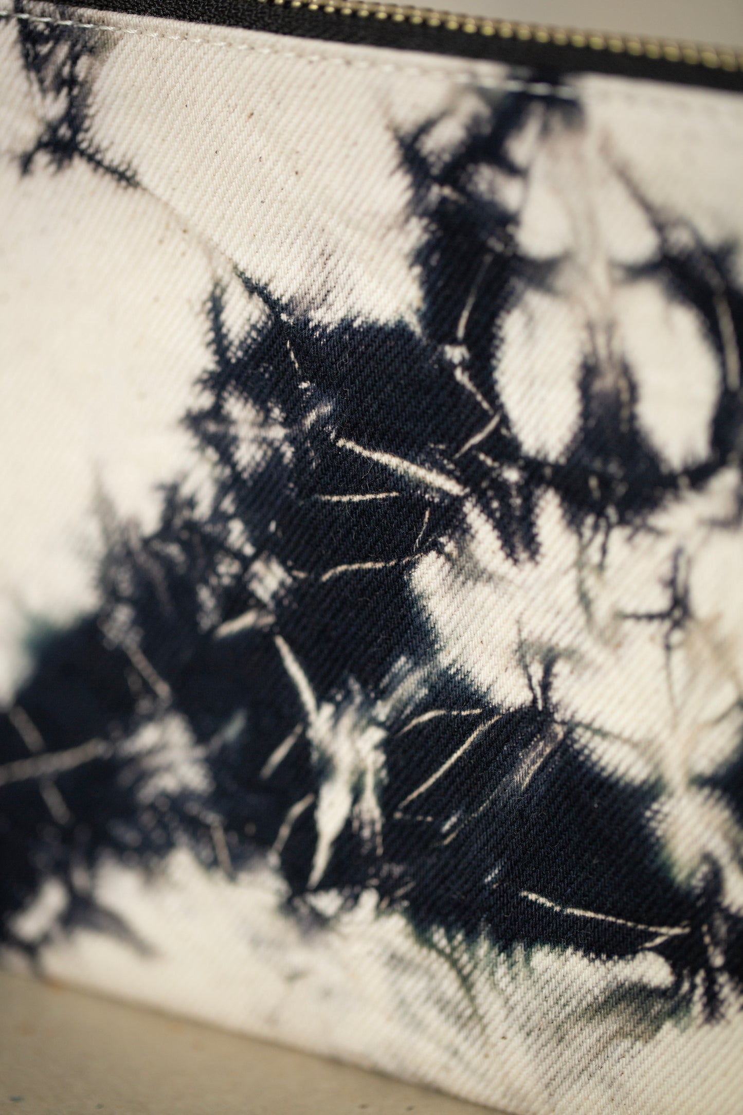 black / ivory organic cotton pouch S with shibori dyed pattern