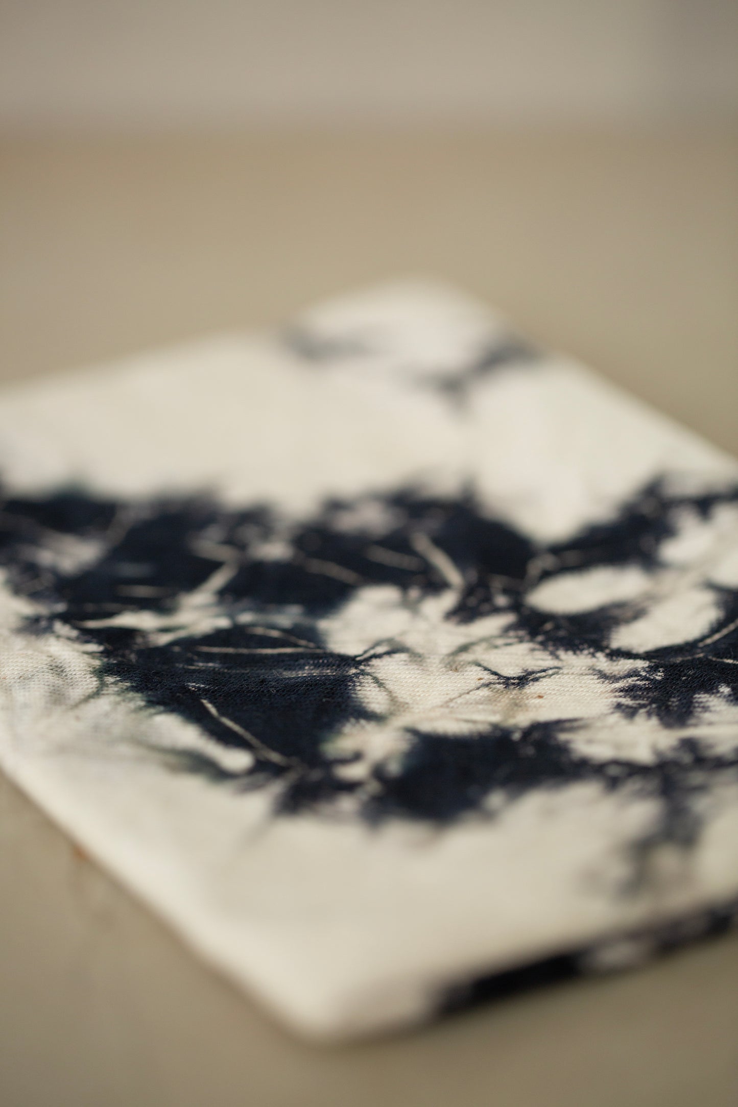 black / ivory organic cotton pouch S with shibori dyed pattern