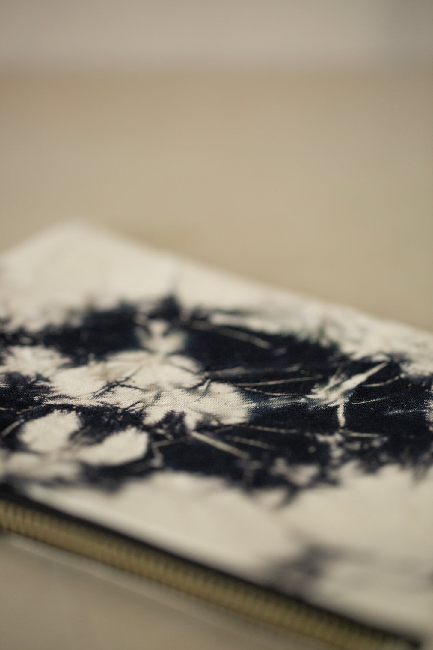 black / ivory organic cotton pouch S with shibori dyed pattern