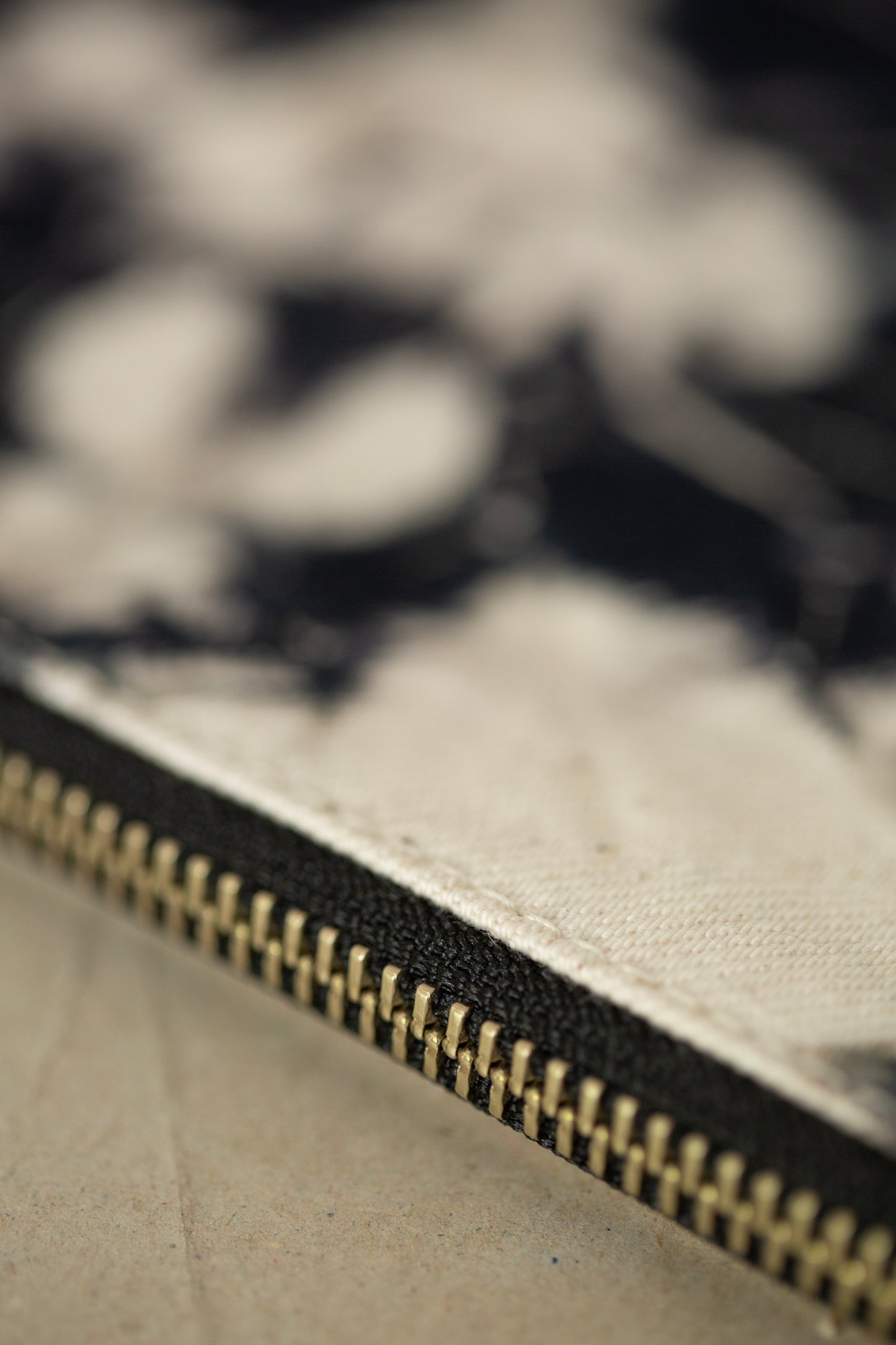 black / ivory organic cotton pouch S with shibori dyed pattern