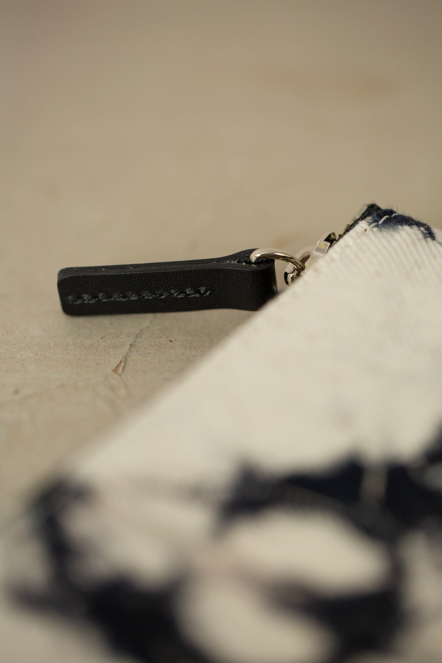 black / ivory organic cotton pouch S with shibori dyed pattern