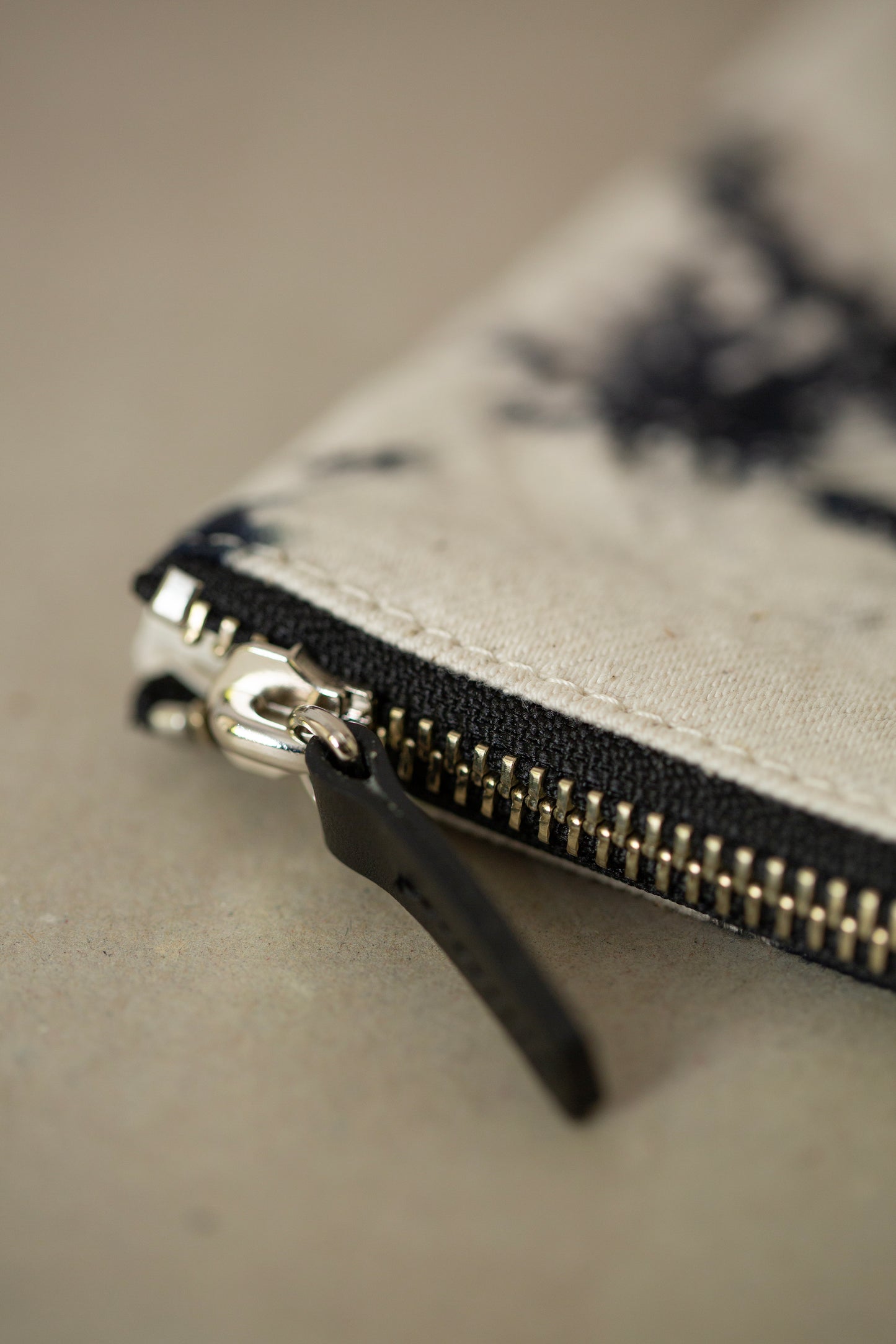black / ivory organic cotton pouch S with shibori dyed pattern
