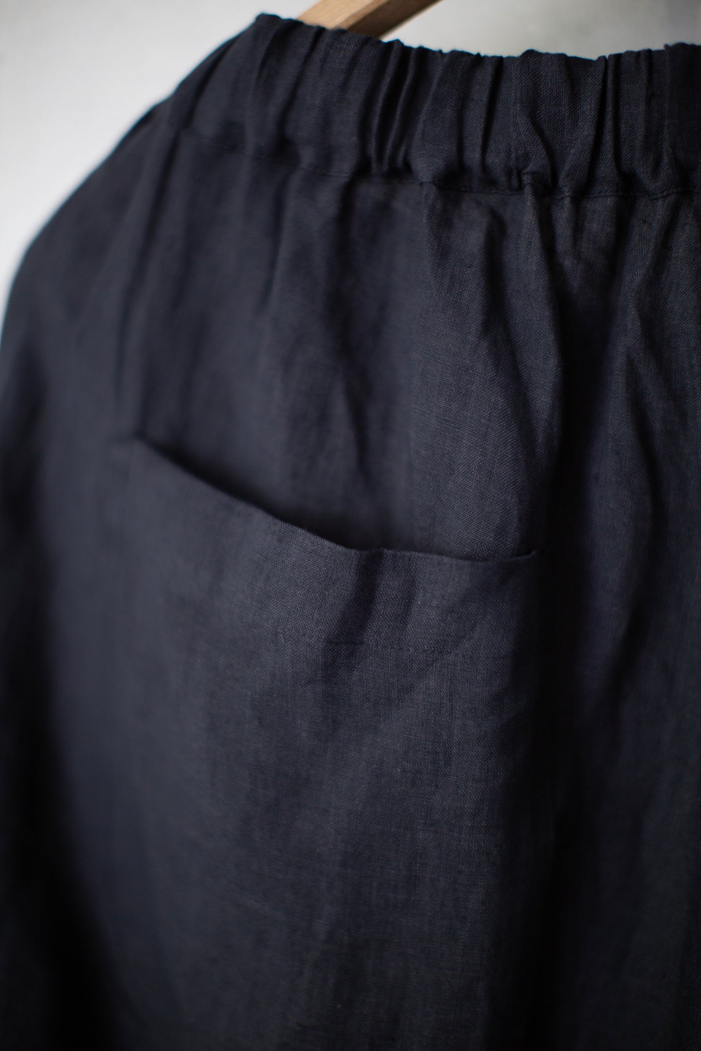 Black unevenly dyed linen trousers