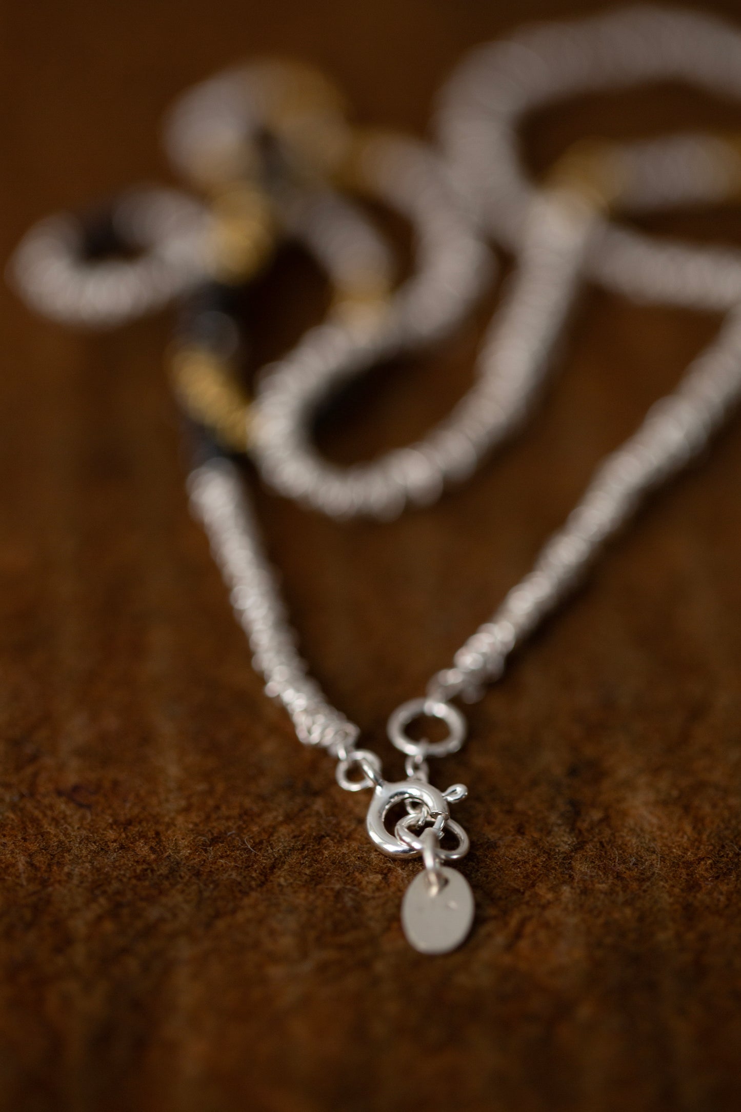 Gathered Necklace in silver, oxidized silver and gold plated silver