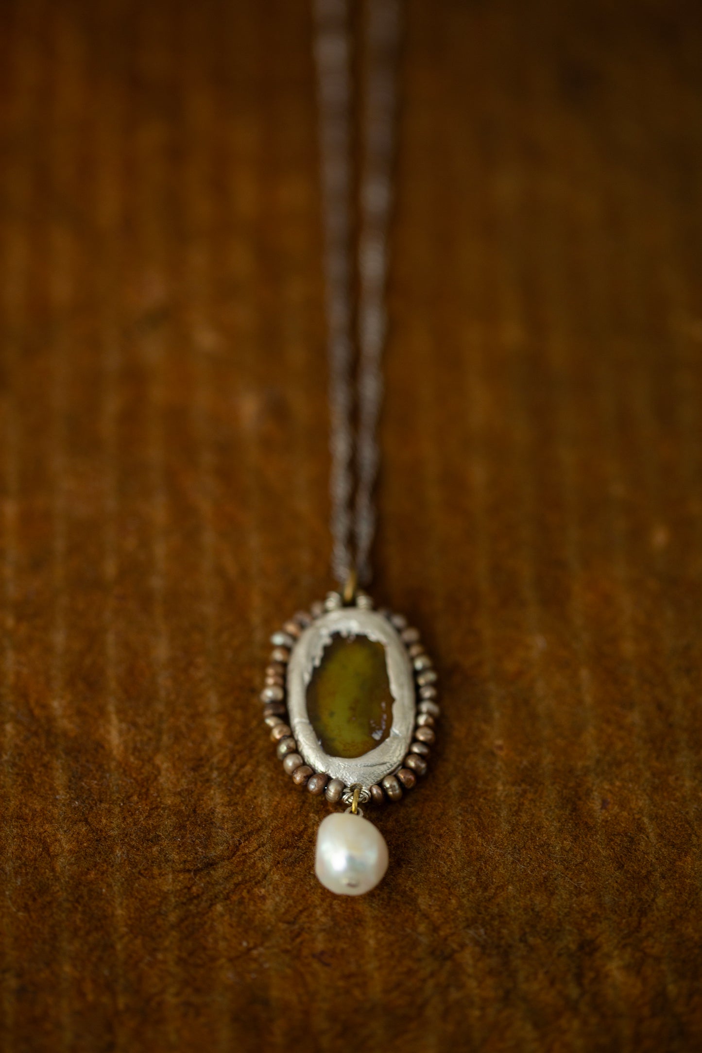 Necklace with antique opaque mirror and pearls