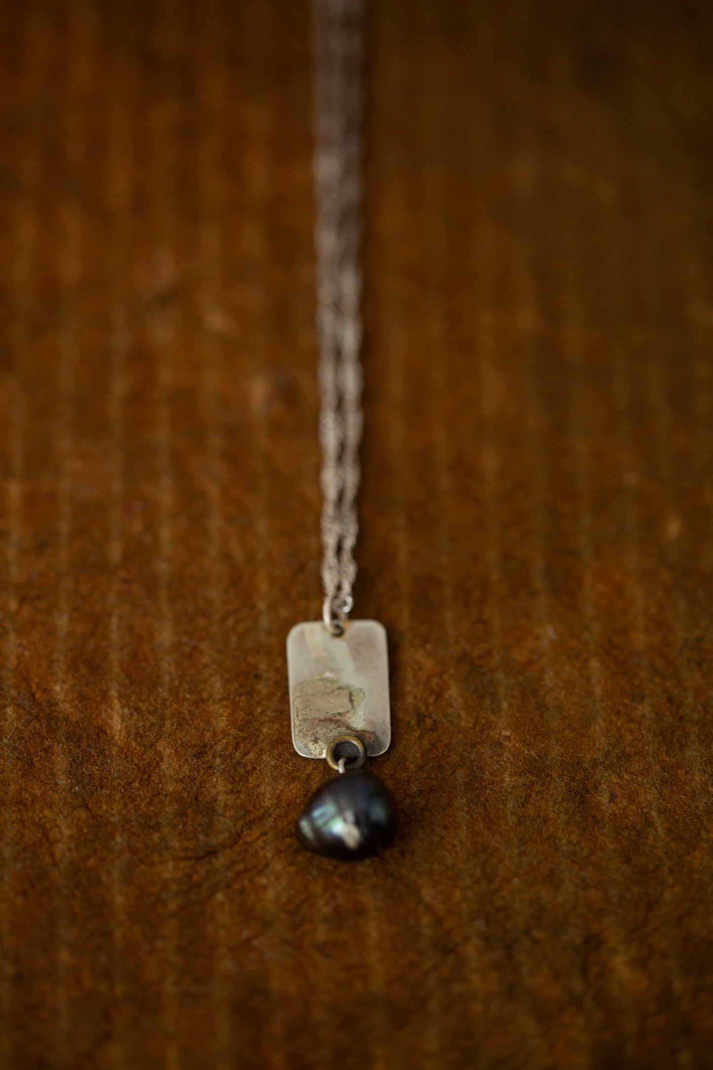 Oxidized silver necklace with plaque and black pearls