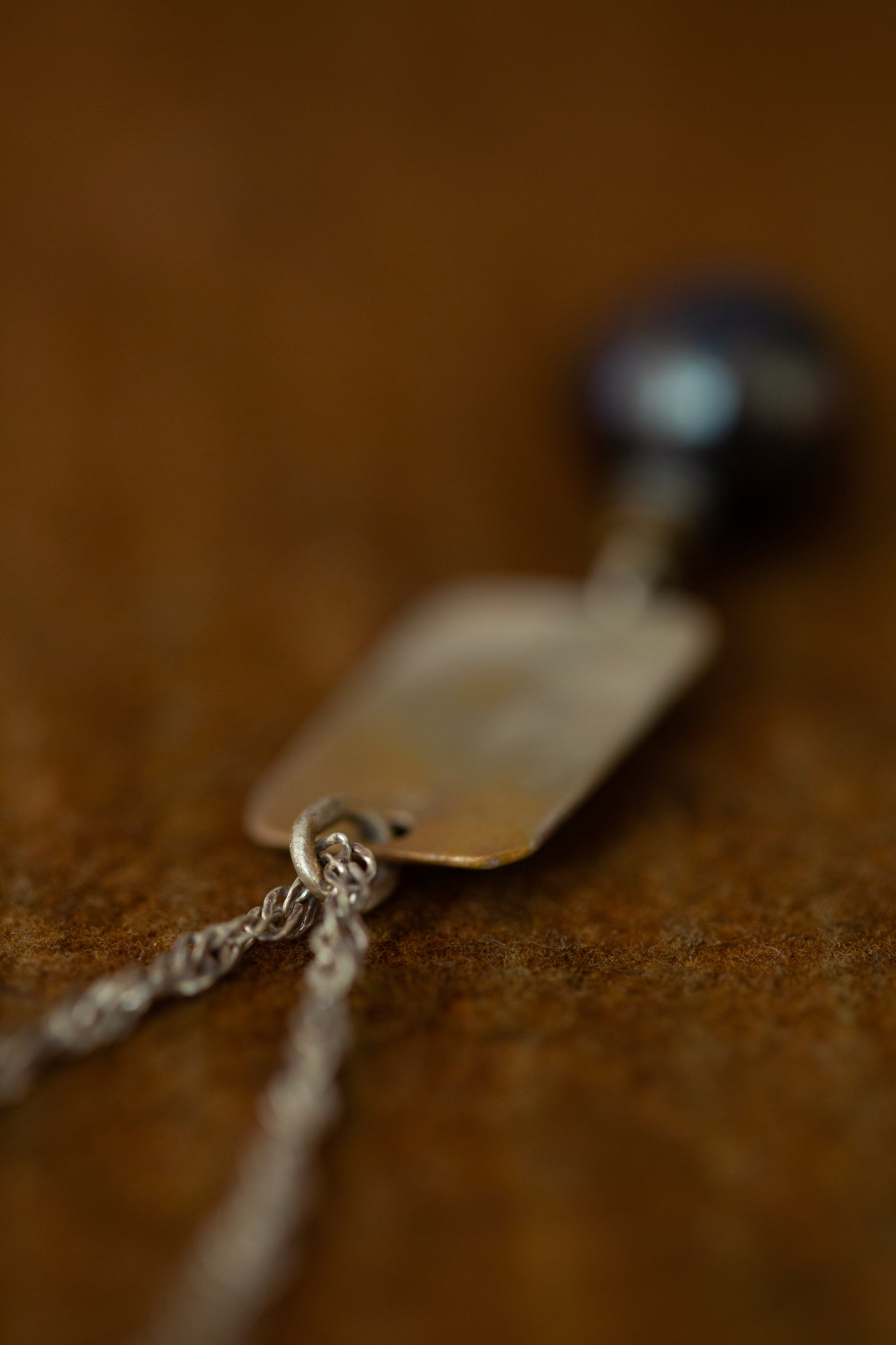 Oxidized silver necklace with plaque and black pearls