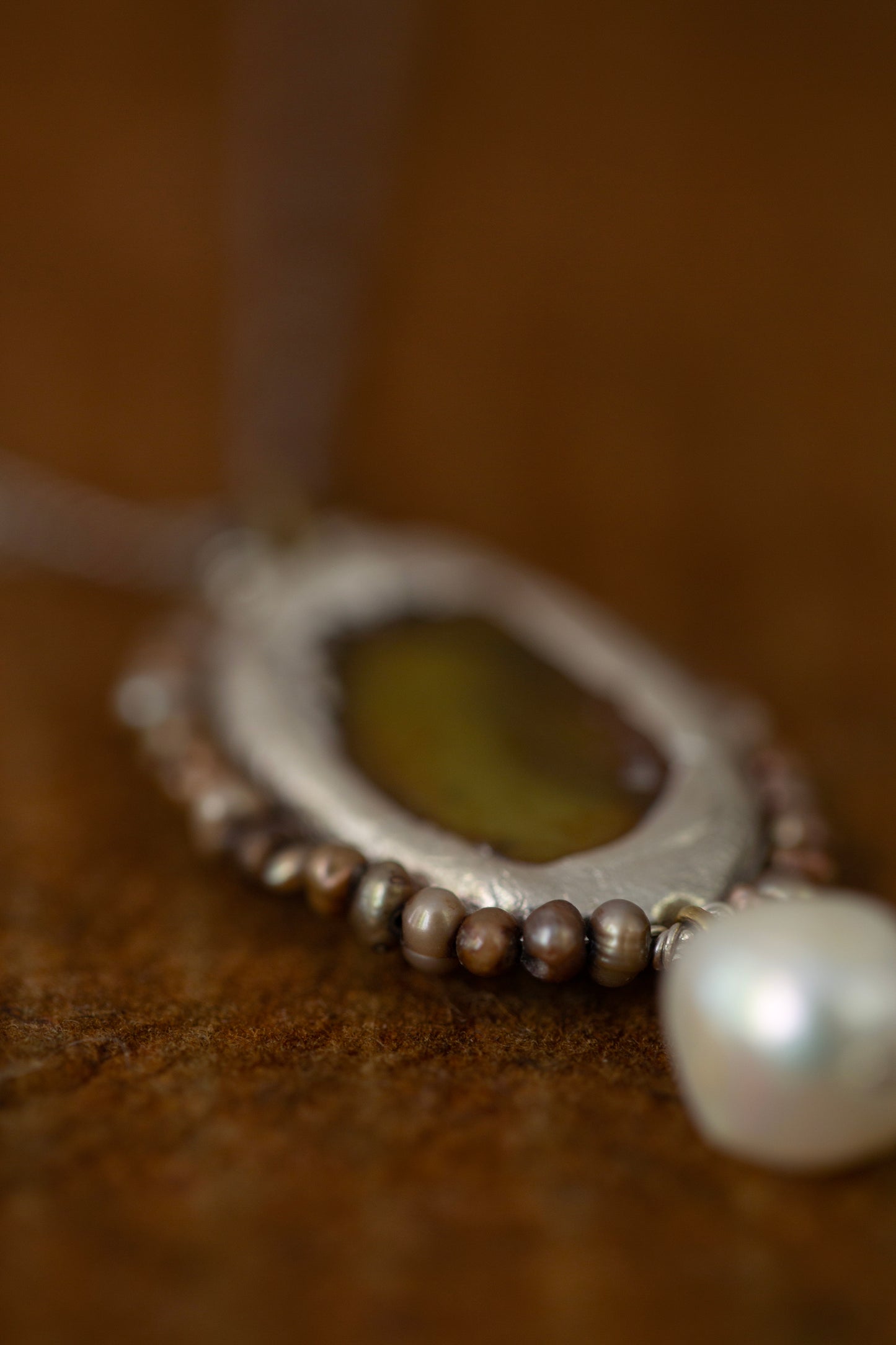 Necklace with antique opaque mirror and pearls