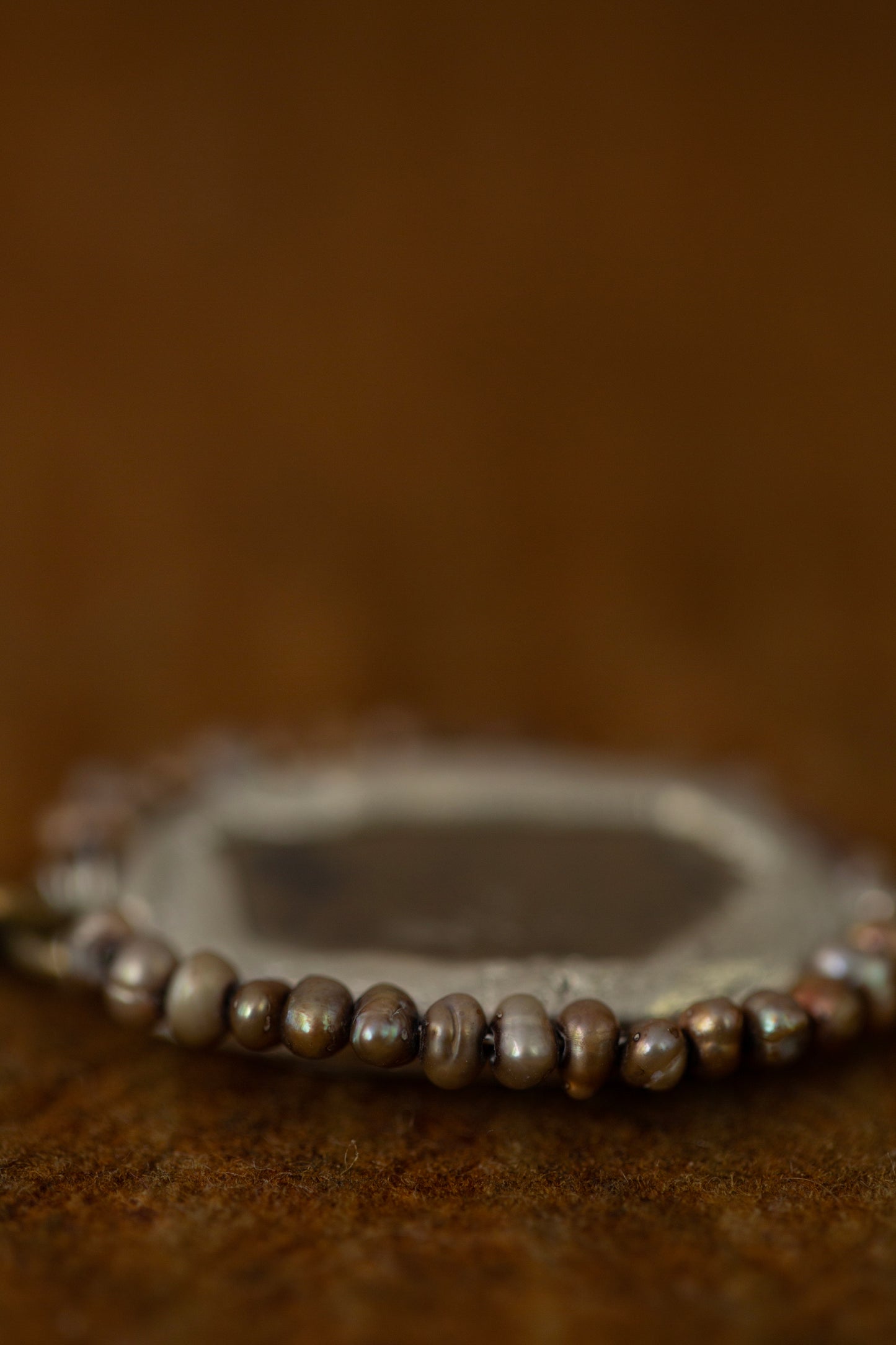 Necklace with antique opaque mirror and pearls
