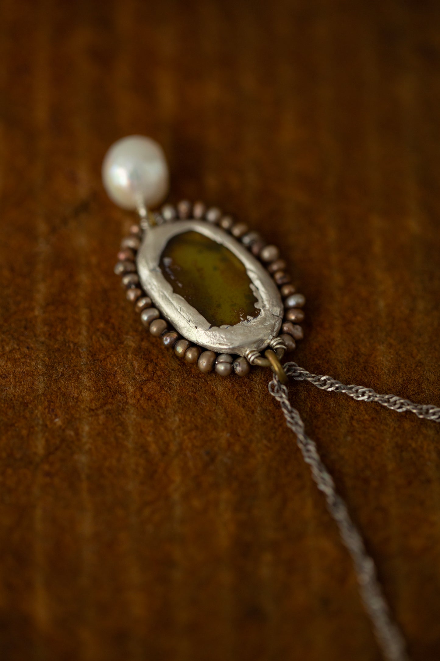 Necklace with antique opaque mirror and pearls