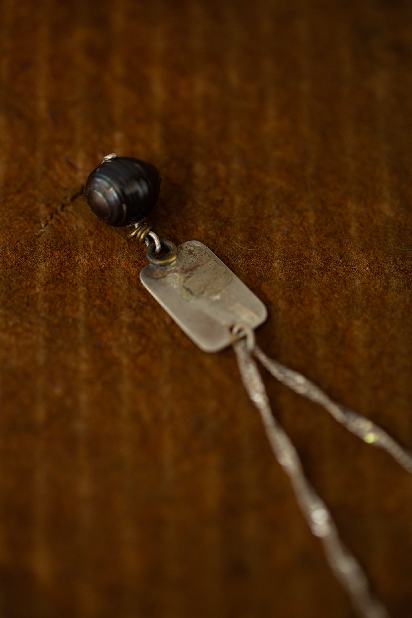 Oxidized silver necklace with plaque and black pearls