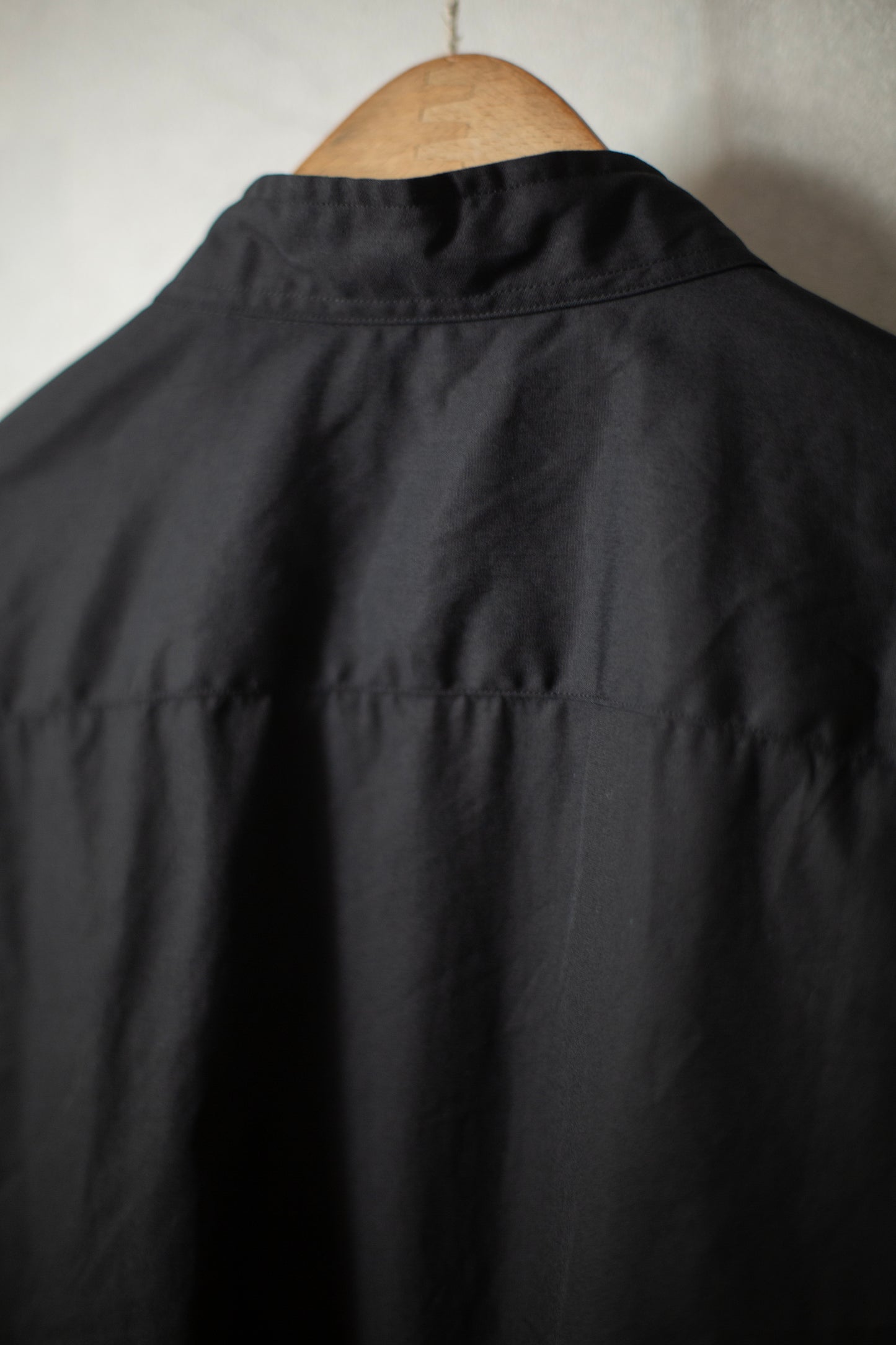 black no collar shirt