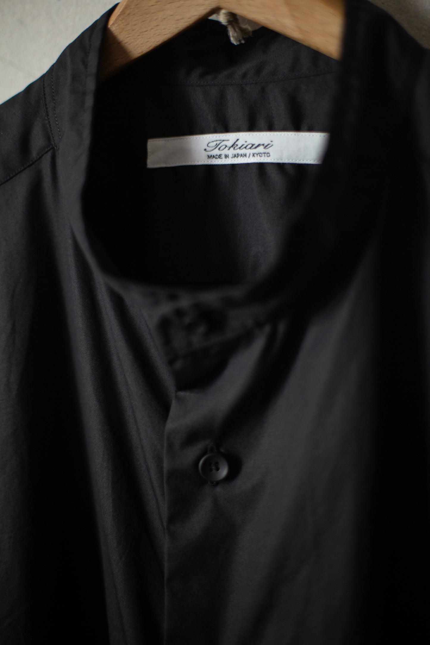 black no collar shirt