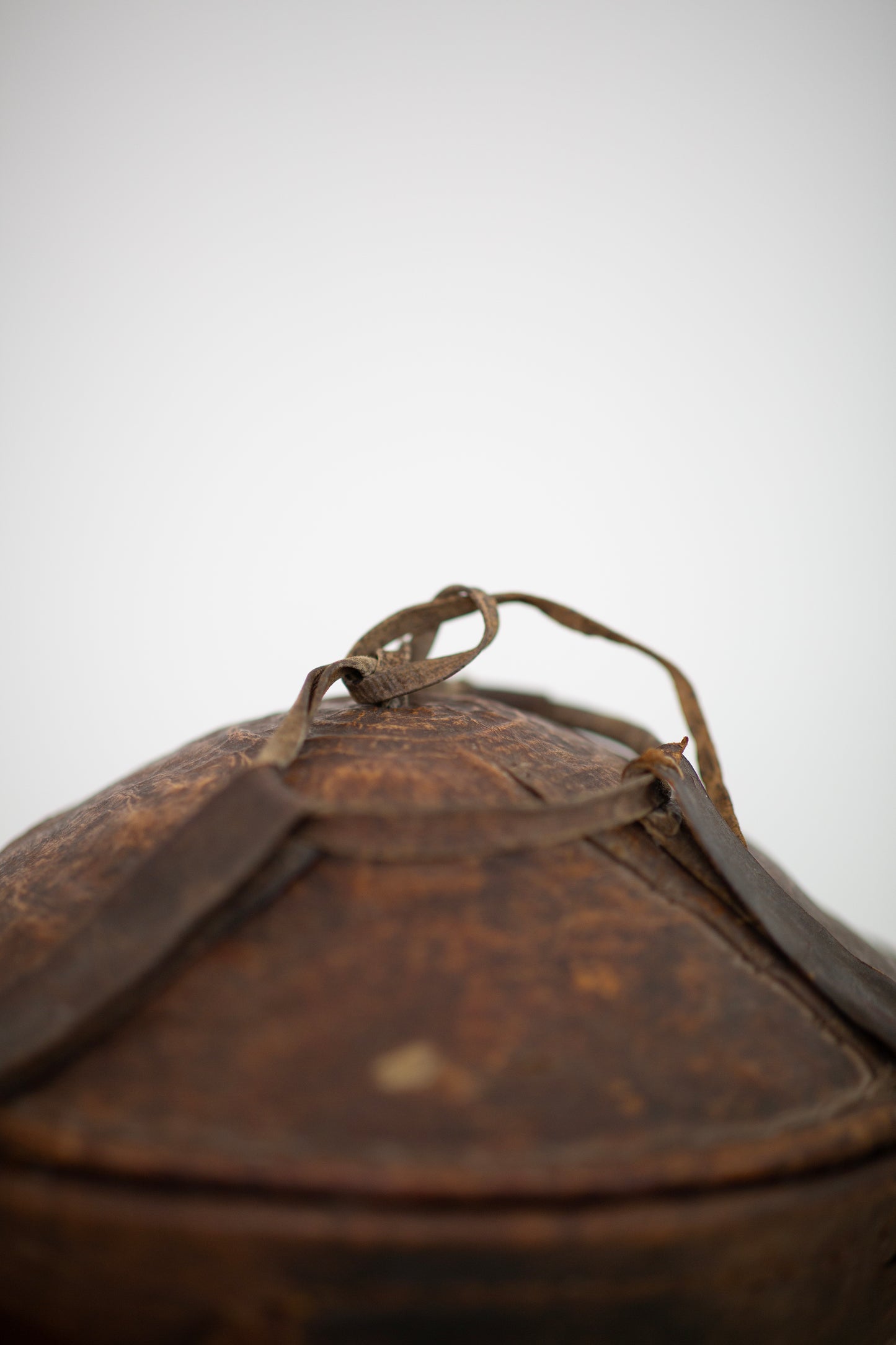Injera bread storage box in leather & straw
