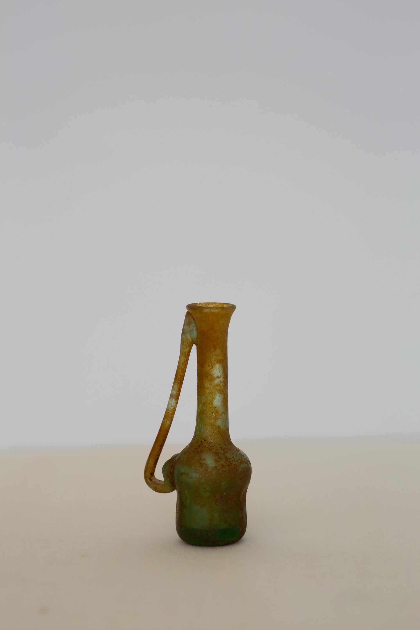 Ancient Roman perfume flask green