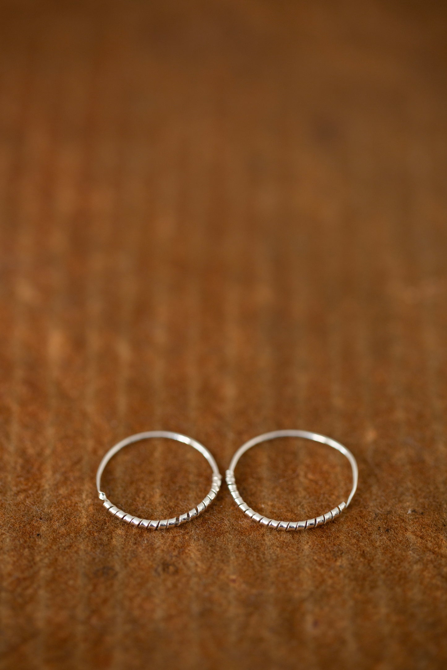 Pair Of Silver Hand Forged Earrings spiral - small