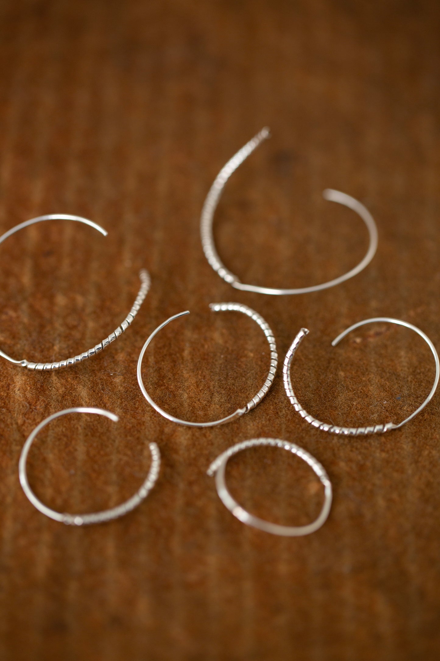 Pair Of Silver Hand Forged Earrings spiral - small