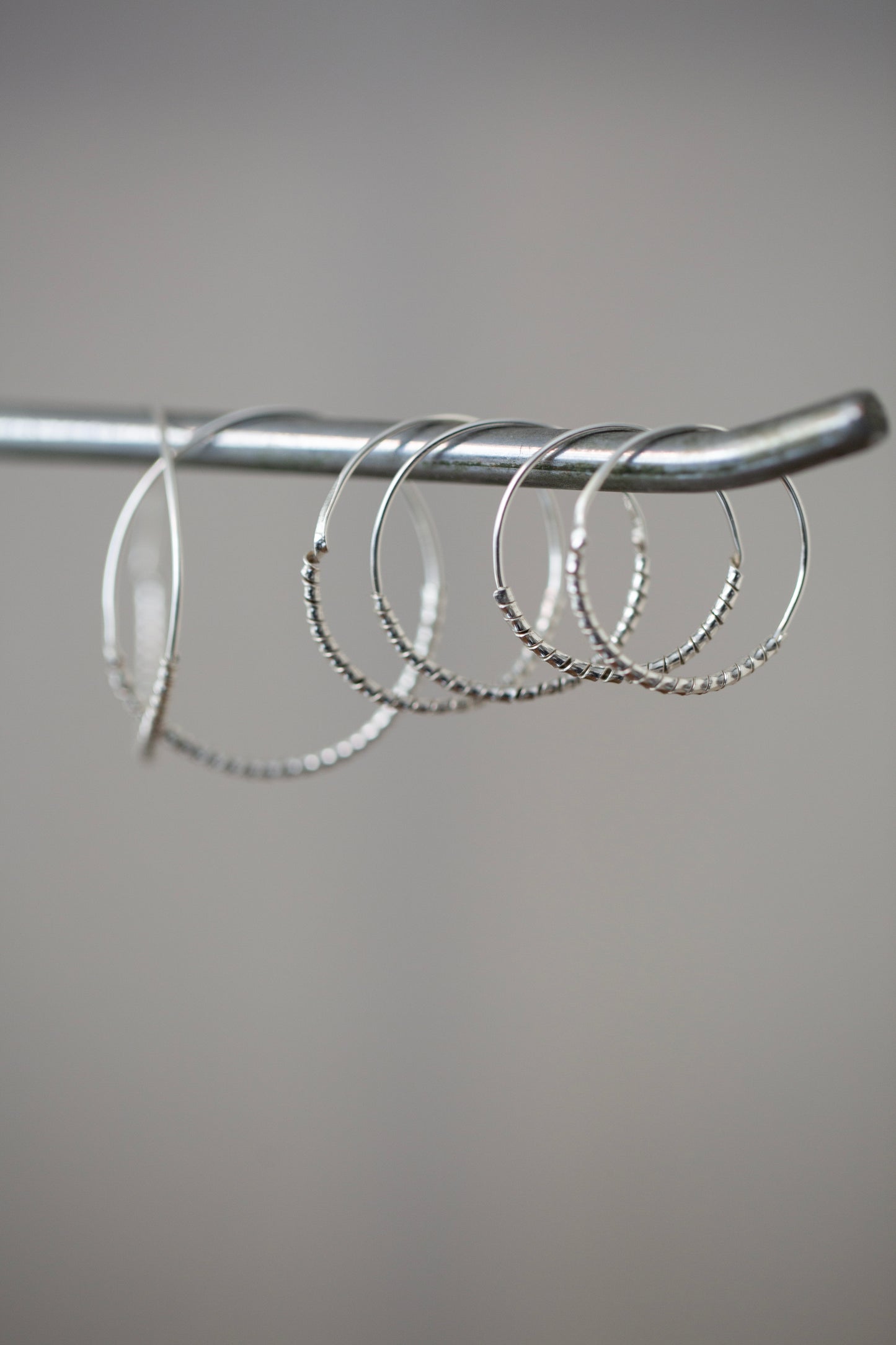 Pair Of Silver Hand Forged Earrings spiral - small