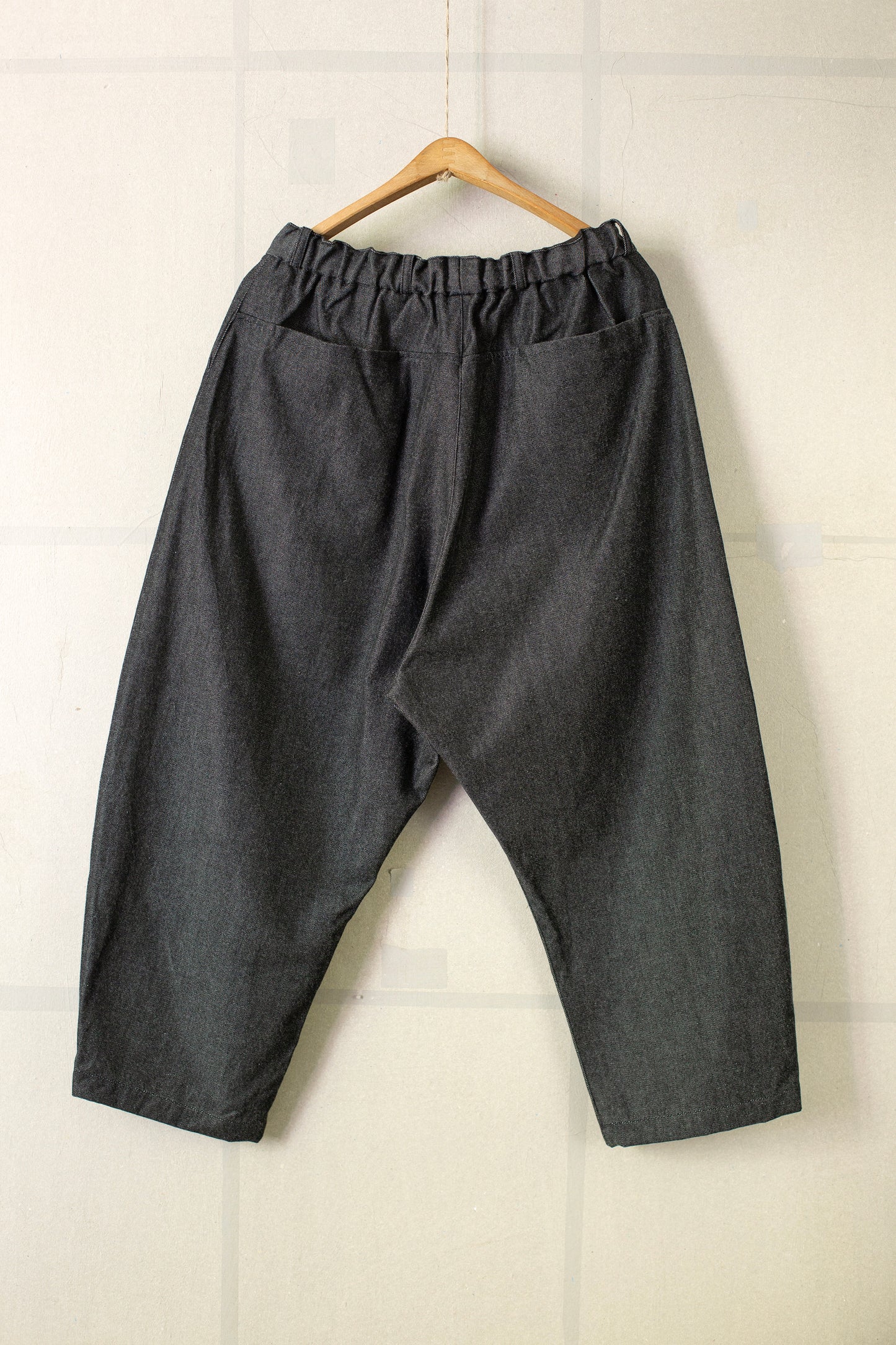 tapered pants in black white wool-cotton twill