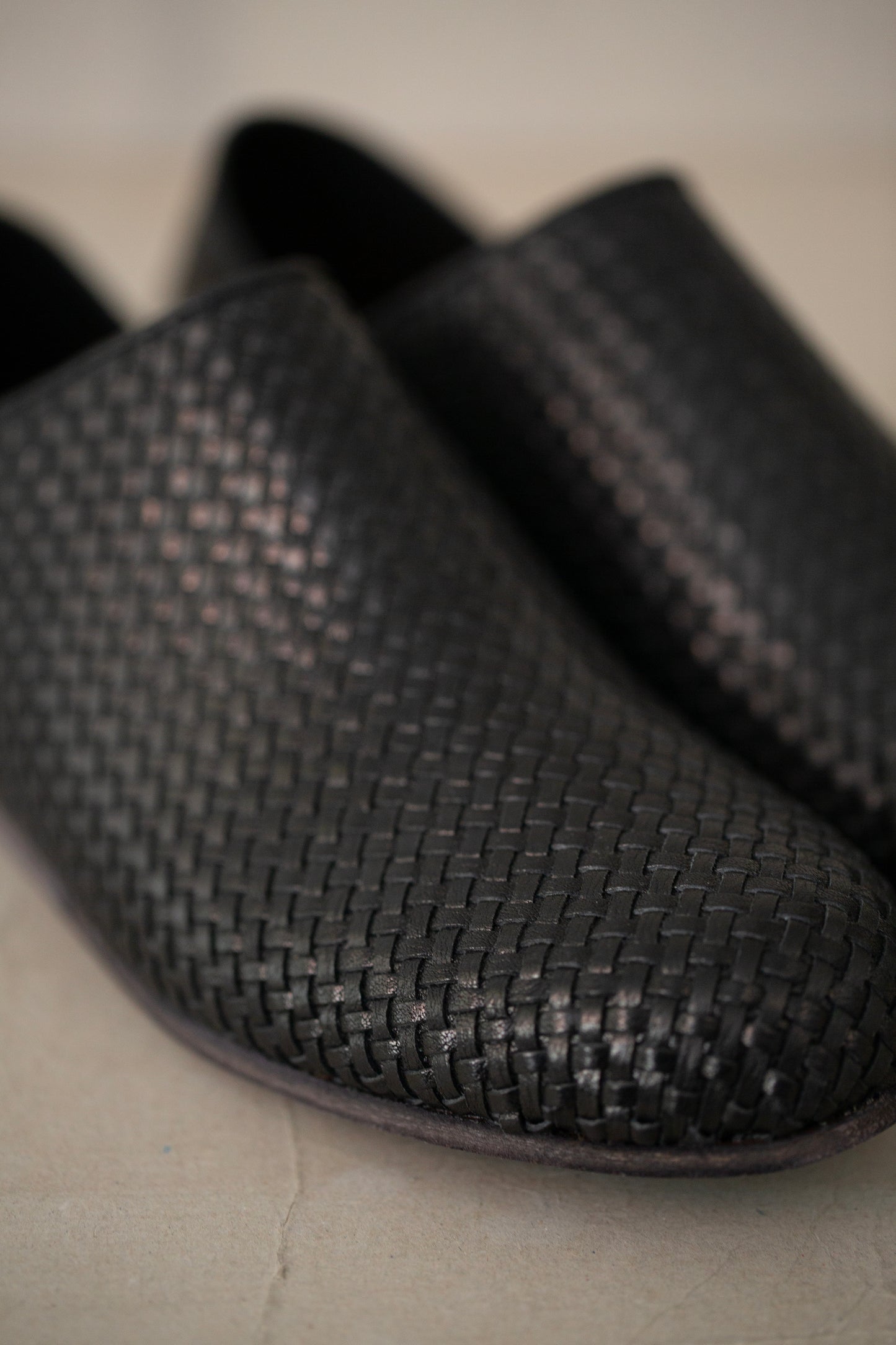 handmade woven cowhide babouche black