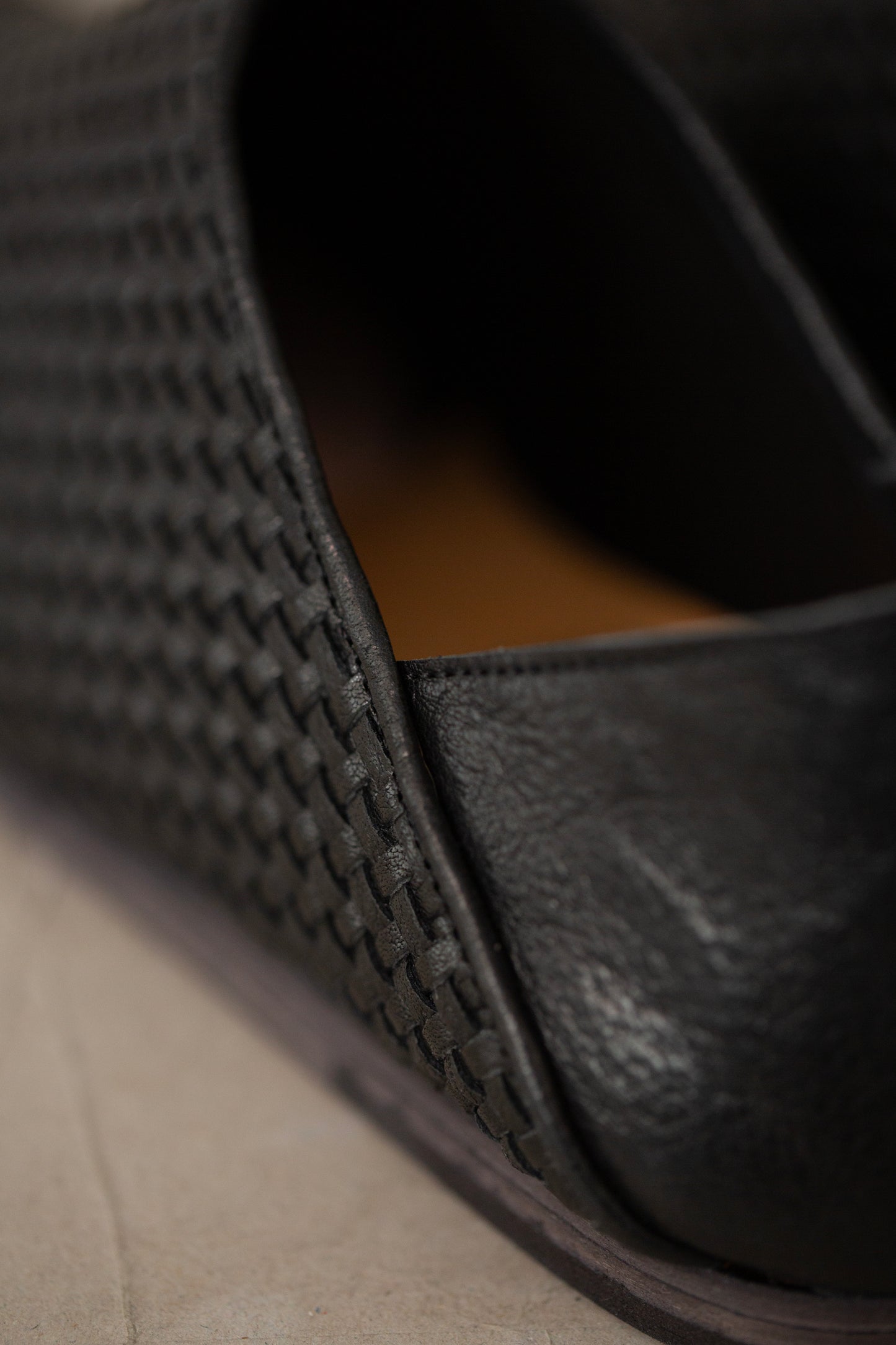 handmade woven cowhide babouche black