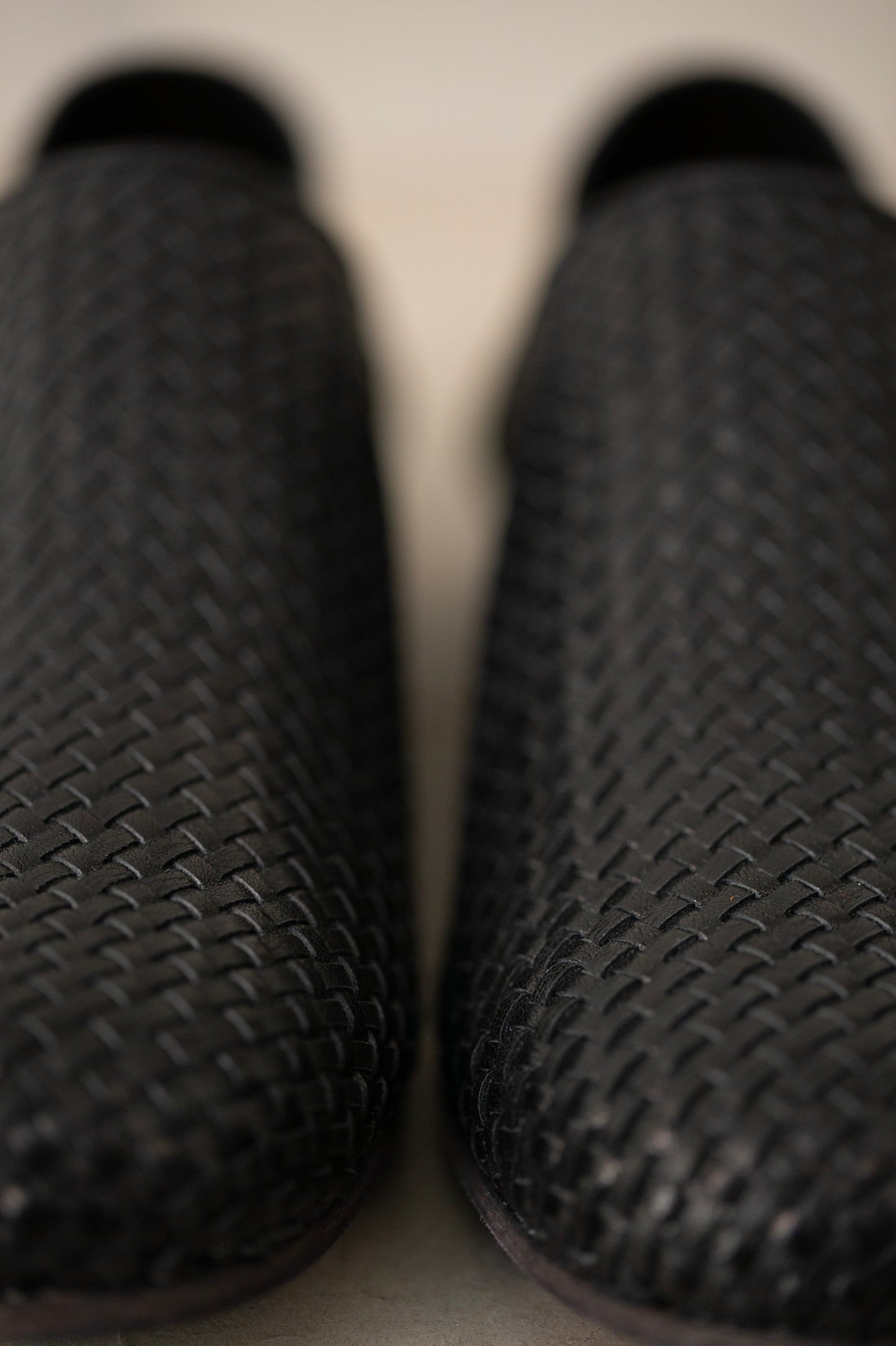 handmade woven cowhide babouche black