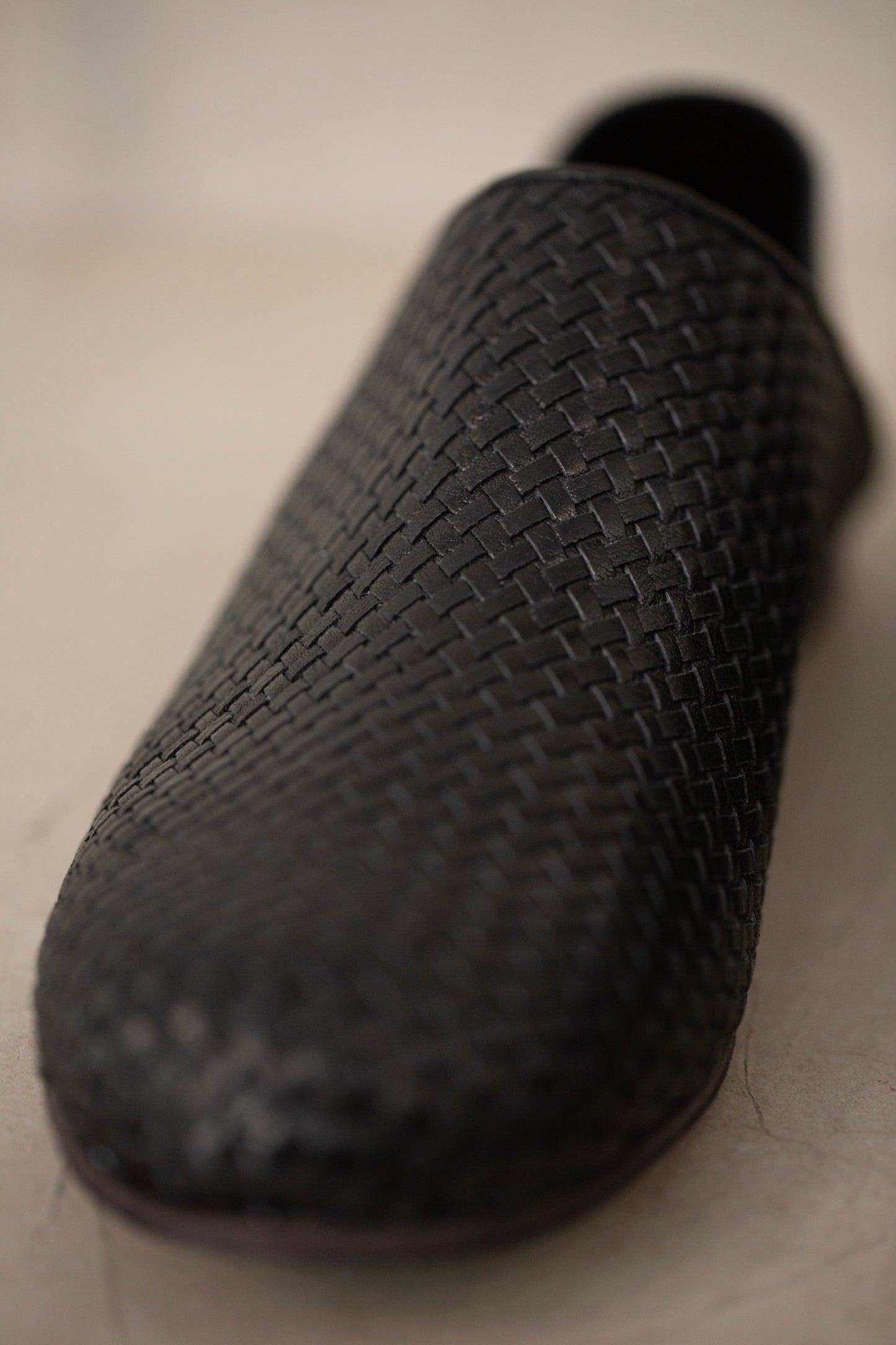 handmade woven cowhide babouche black